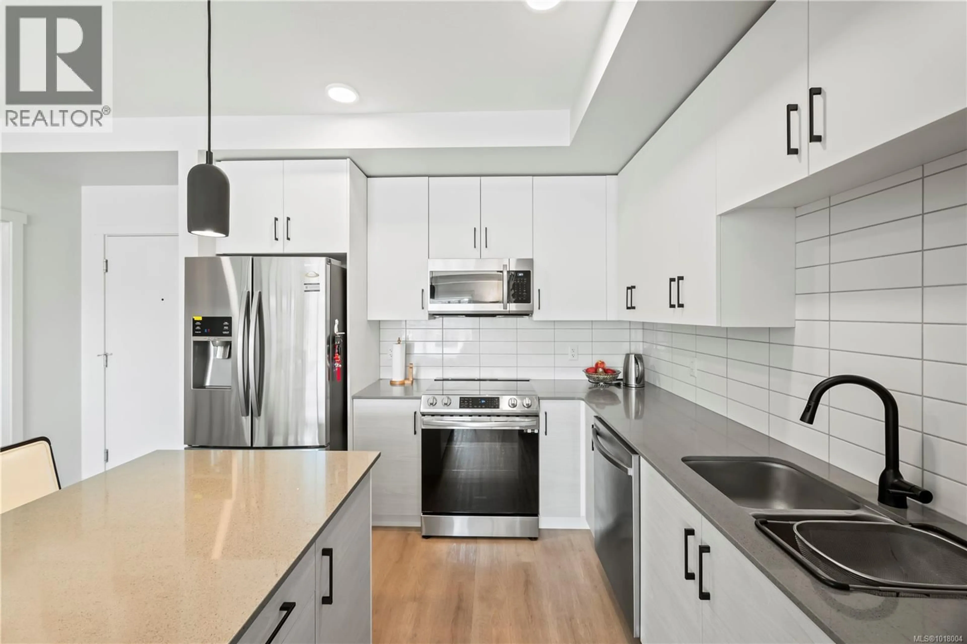 Open concept kitchen, unknown for 601 - 2465 GATEWAY ROAD, Langford British Columbia V9B6R1