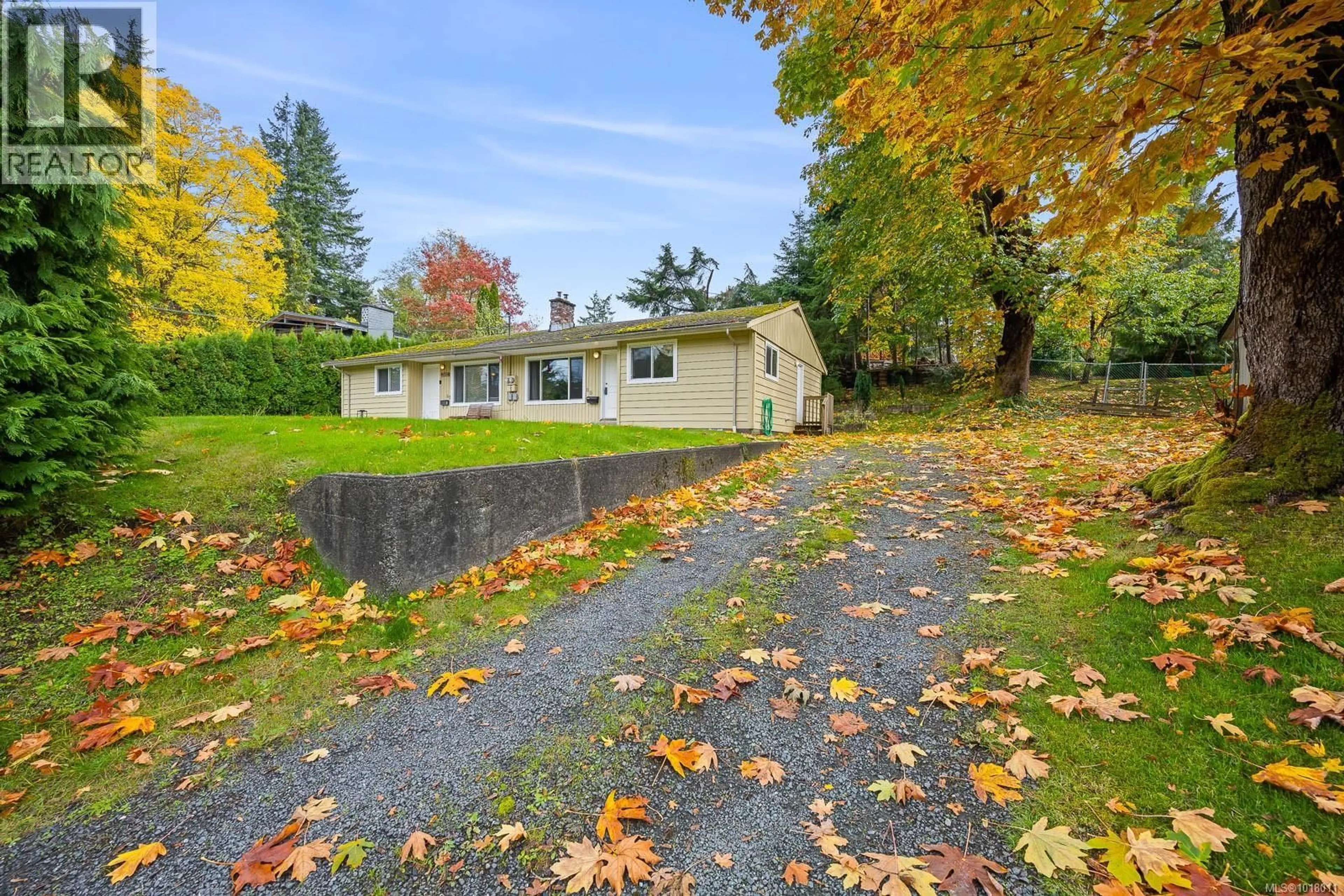 A pic from outside/outdoor area/front of a property/back of a property/a pic from drone, street for 65 TAYLOR WAY, Campbell River British Columbia V9W3A7