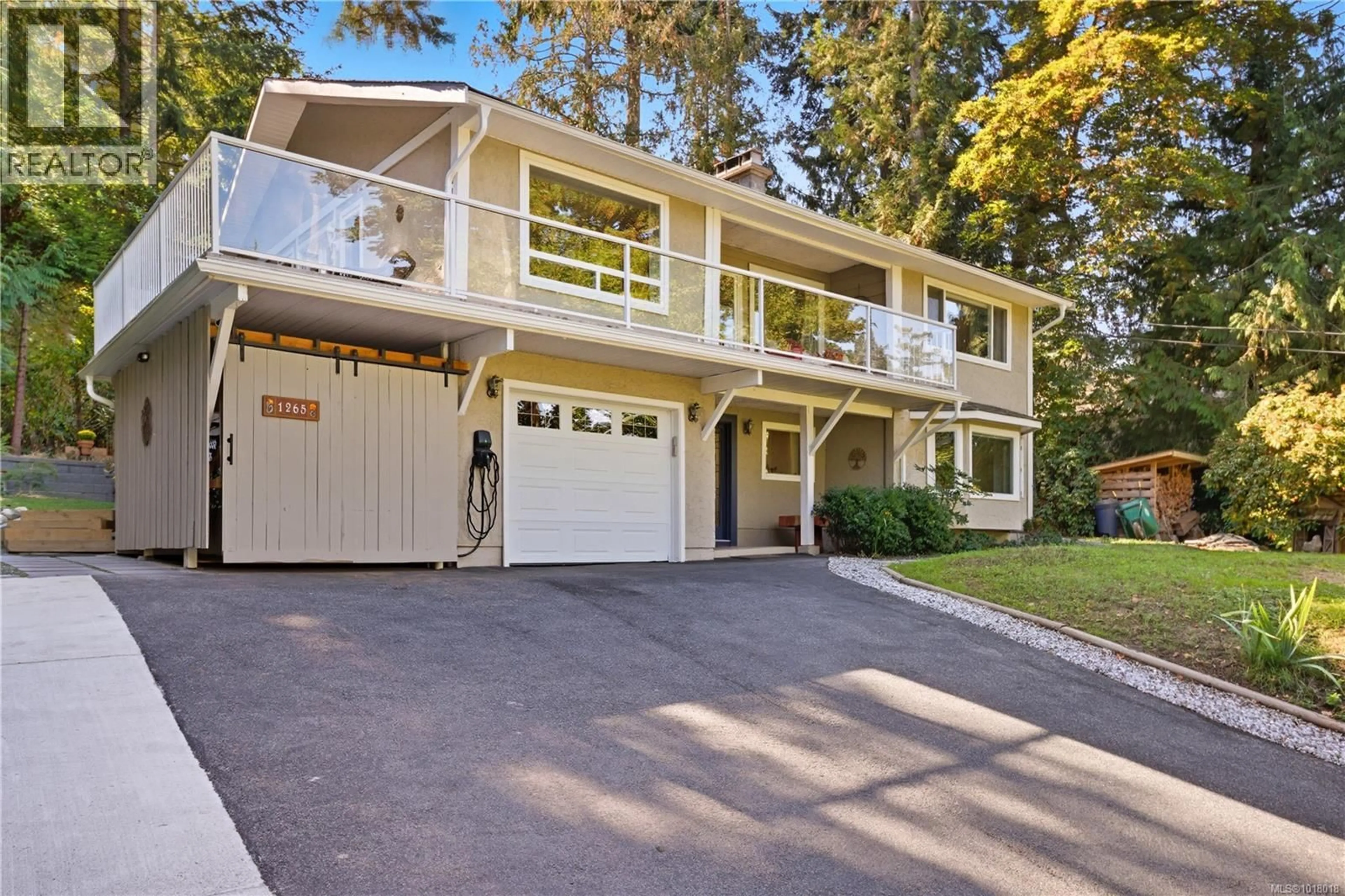 Home with vinyl exterior material, street for 1265 CLOAKE HILL ROAD, North Saanich British Columbia V8L5K3