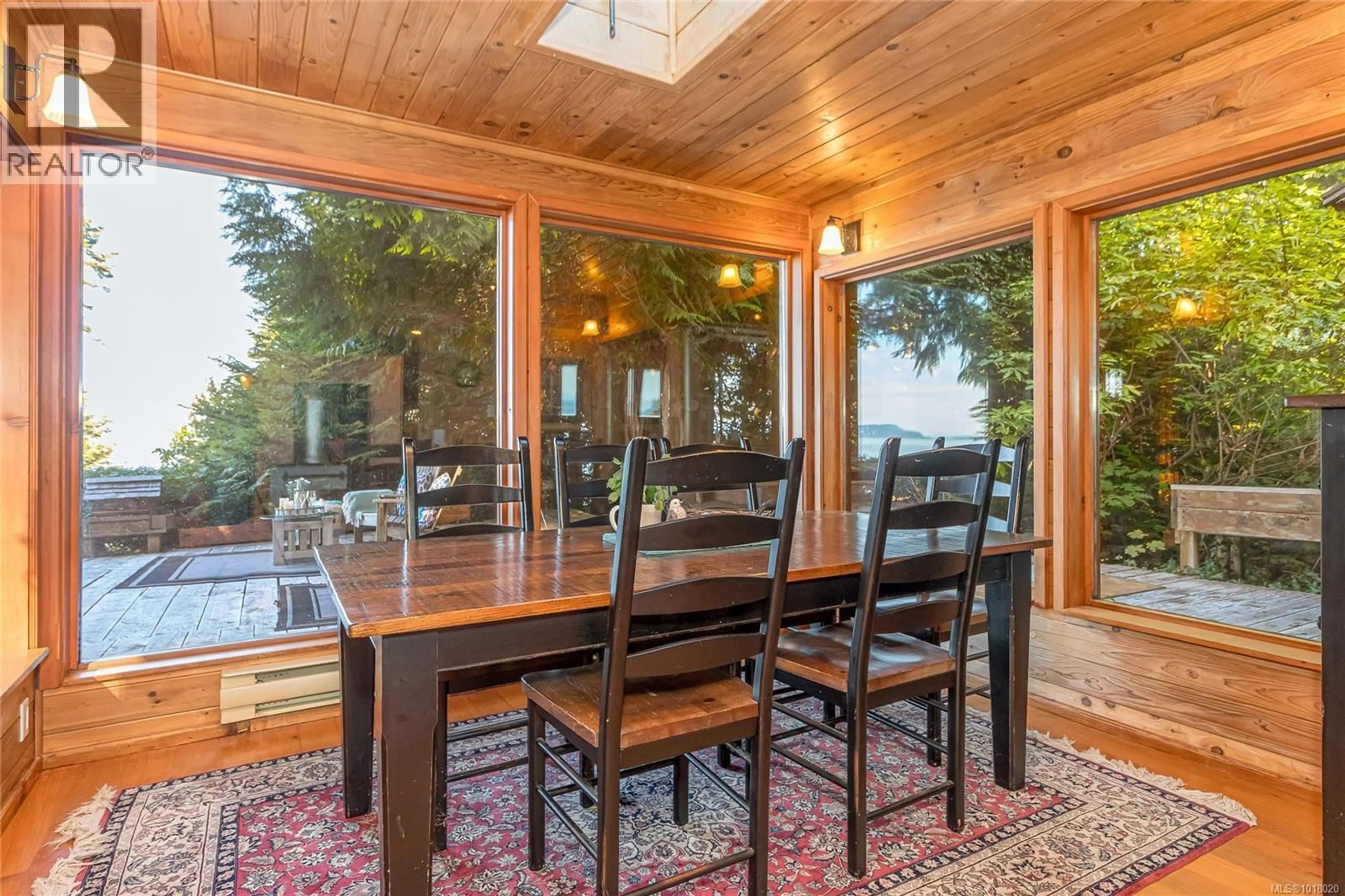 Dining room, wood/laminate floor for 235 SPEARFISH ROAD, Qualicum Beach British Columbia V9K2A6