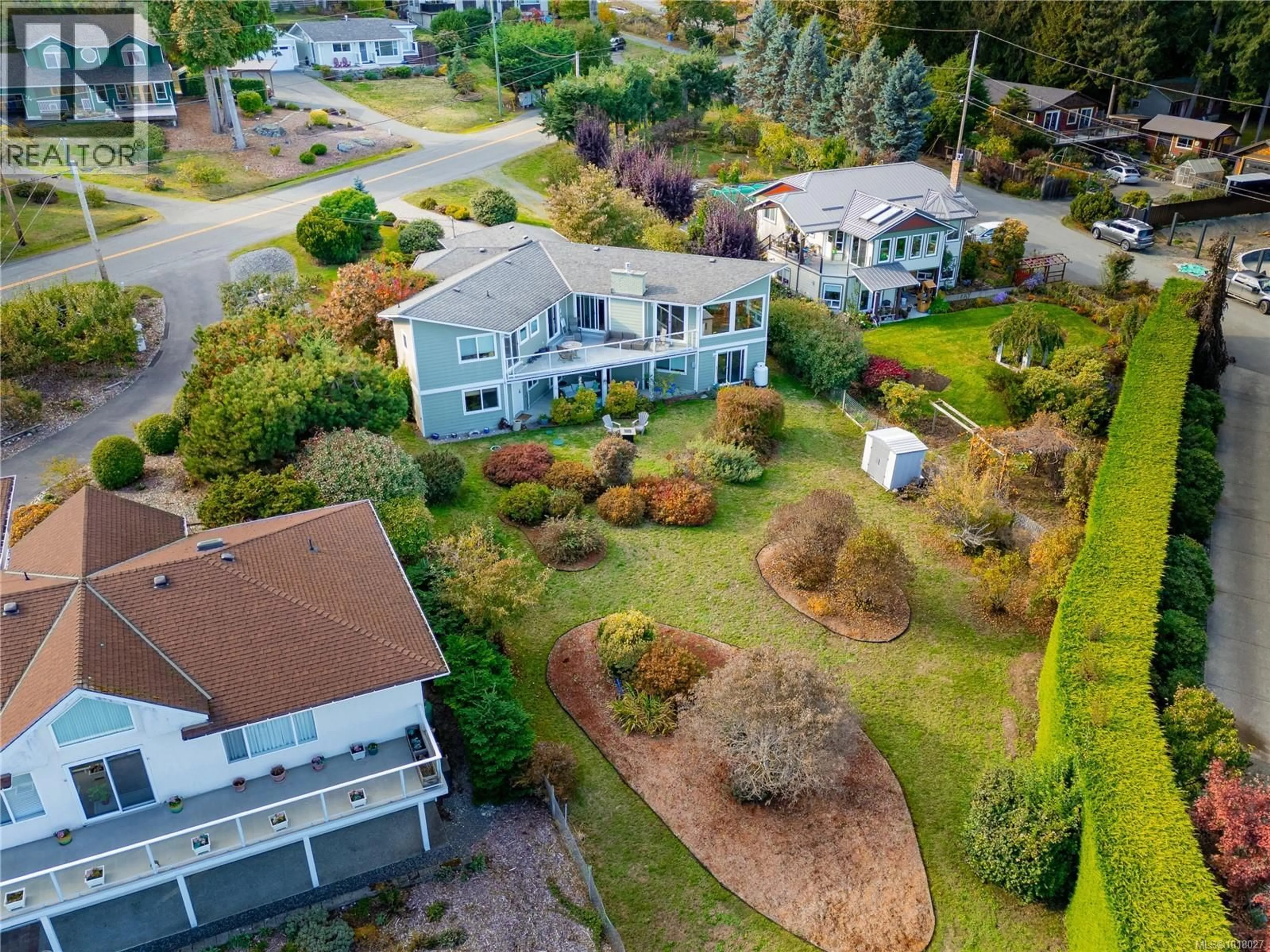 A pic from outside/outdoor area/front of a property/back of a property/a pic from drone, street for 2509 MILL BAY ROAD, Mill Bay British Columbia V8H1C6