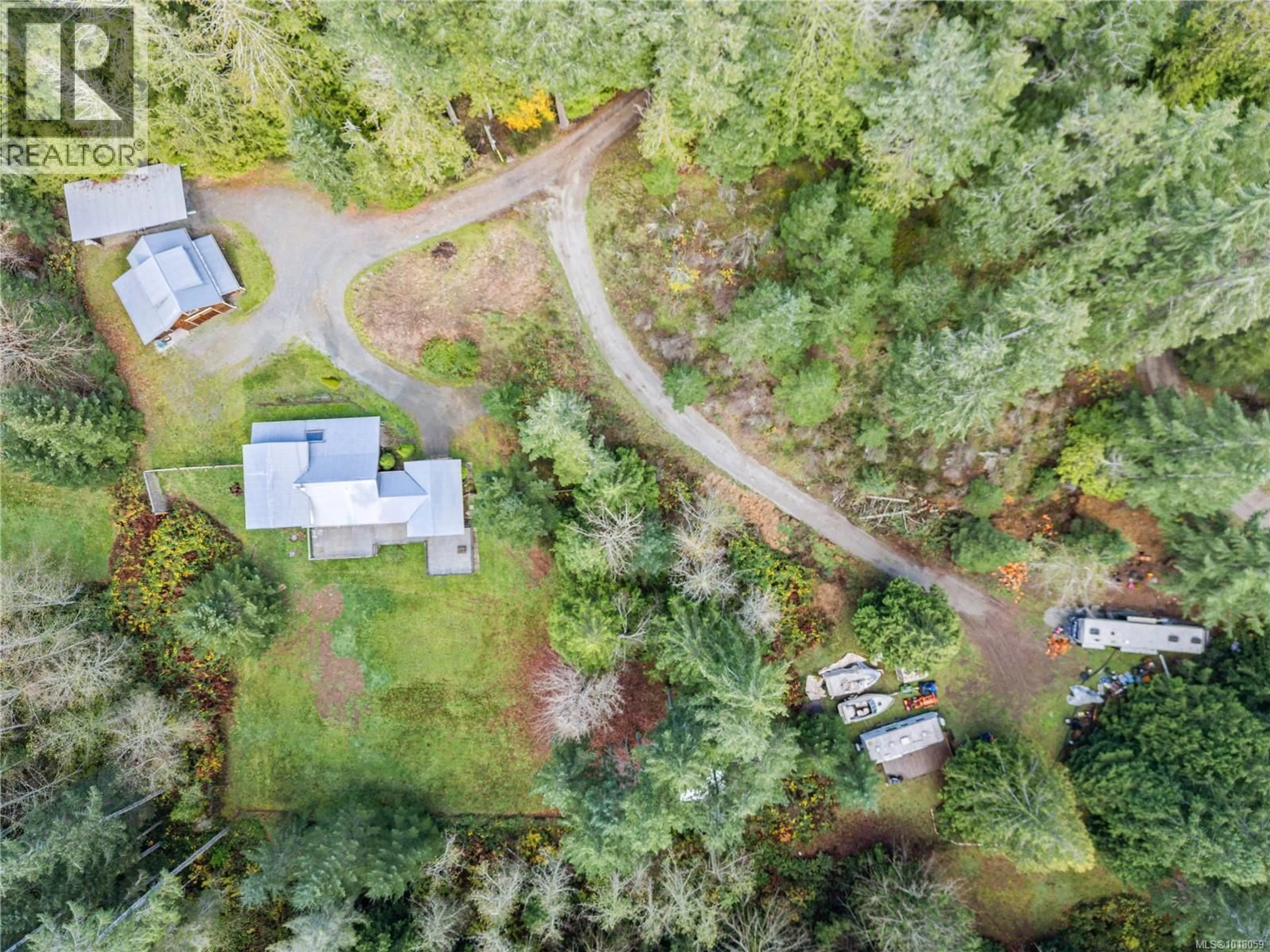 A pic from outside/outdoor area/front of a property/back of a property/a pic from drone, forest/trees view for 211 LONG HARBOUR ROAD, Salt Spring British Columbia V8K2K9