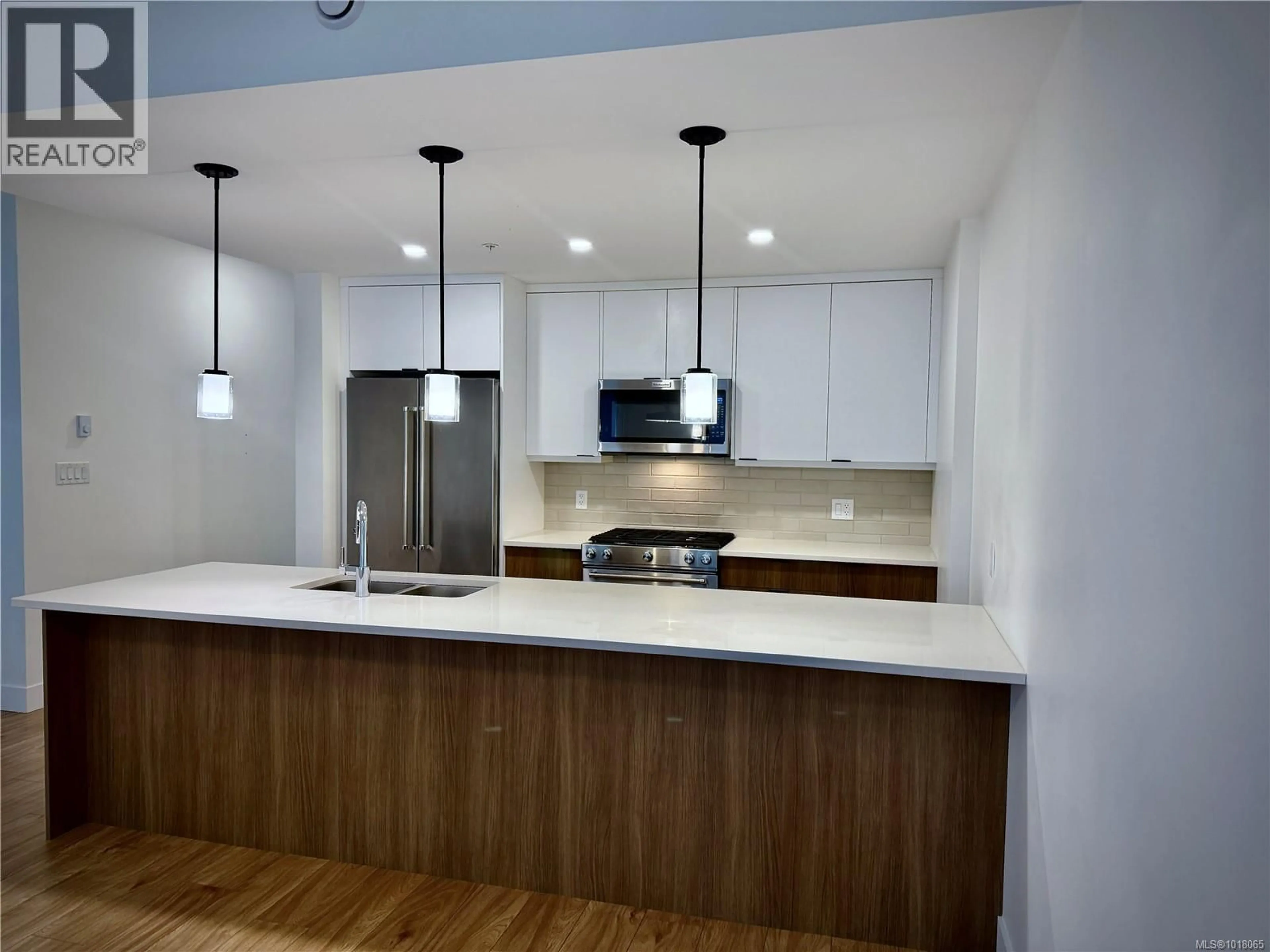 Open concept kitchen, wood/laminate floor for 14 - 2330 SOOKE ROAD, Colwood British Columbia V9B1X7