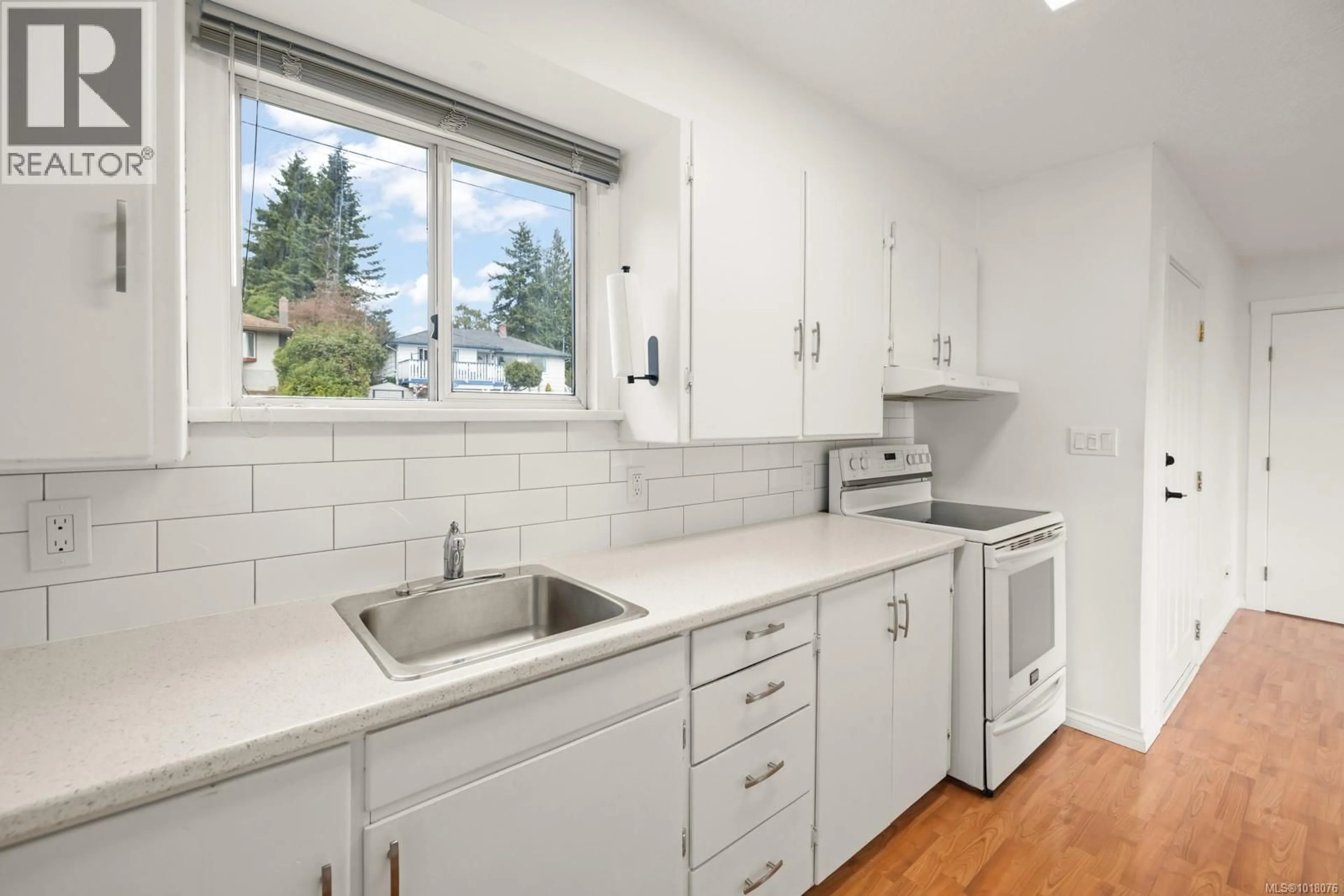 Standard kitchen, ceramic/tile floor for 6675 GOODMERE ROAD, Sooke British Columbia V7Z1H6
