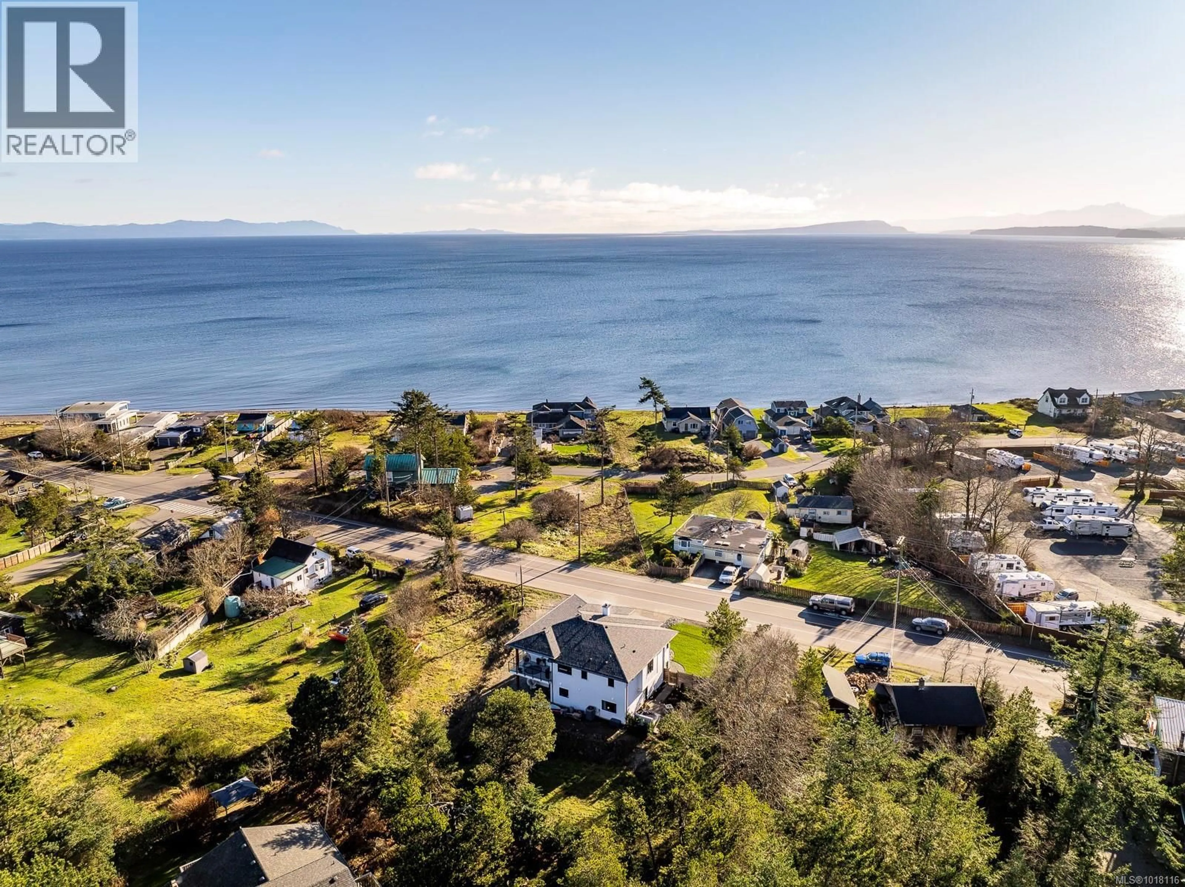 A pic from outside/outdoor area/front of a property/back of a property/a pic from drone, water/lake/river/ocean view for 650 LAZO ROAD, Comox British Columbia V9M3V4