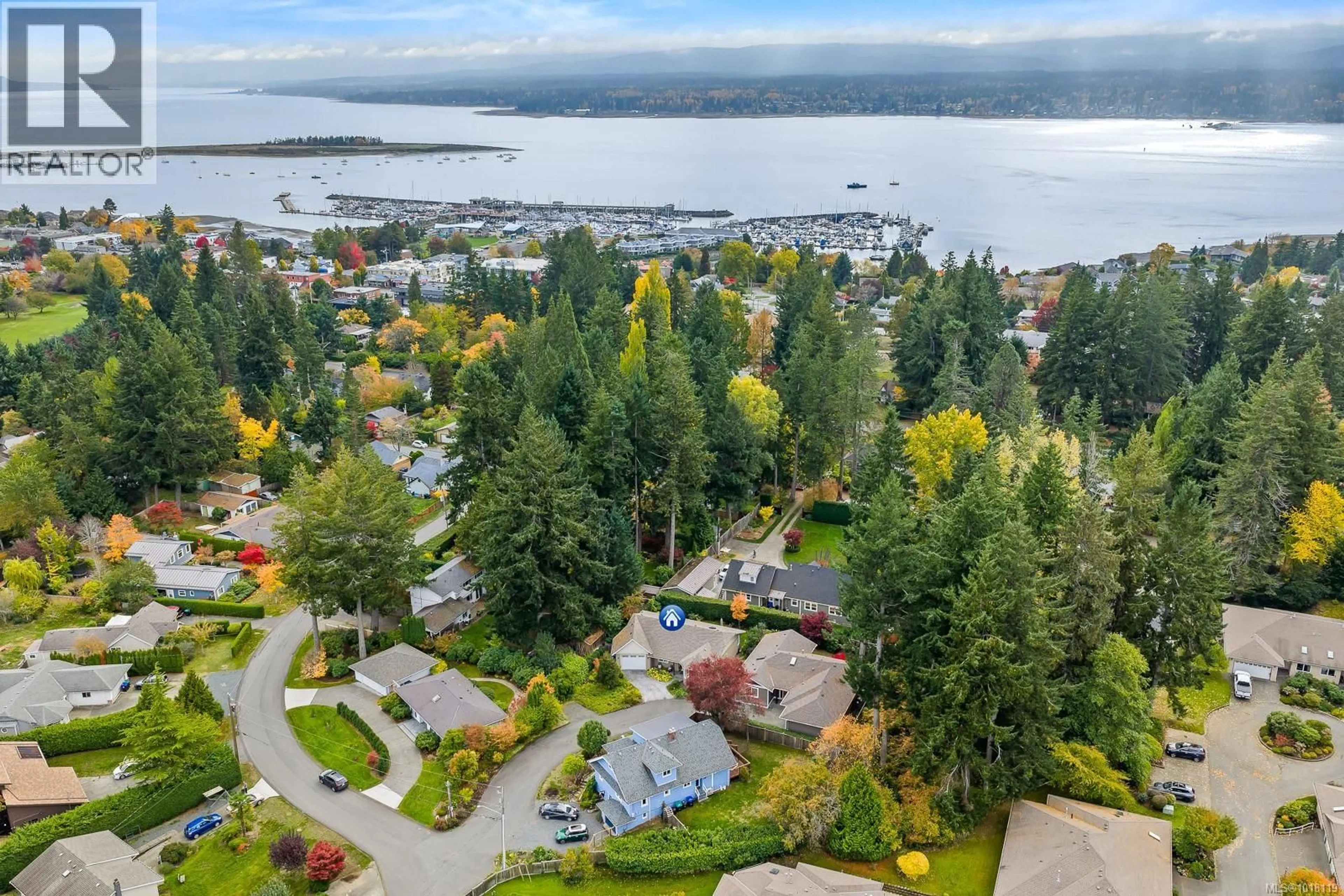 A pic from outside/outdoor area/front of a property/back of a property/a pic from drone, water/lake/river/ocean view for 1861 QUEENS AVENUE, Comox British Columbia V9M2B8