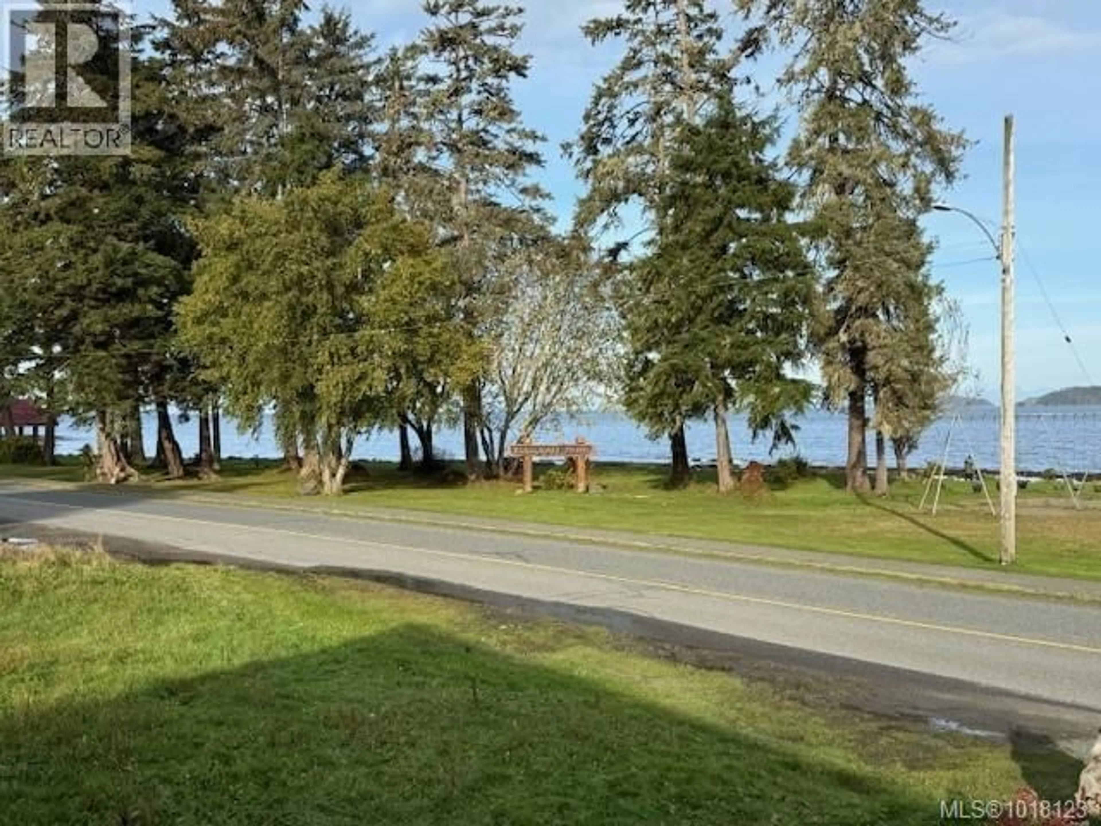 A pic from outside/outdoor area/front of a property/back of a property/a pic from drone, water/lake/river/ocean view for 7550 MARKET STREET, Port Hardy British Columbia V0N2P0