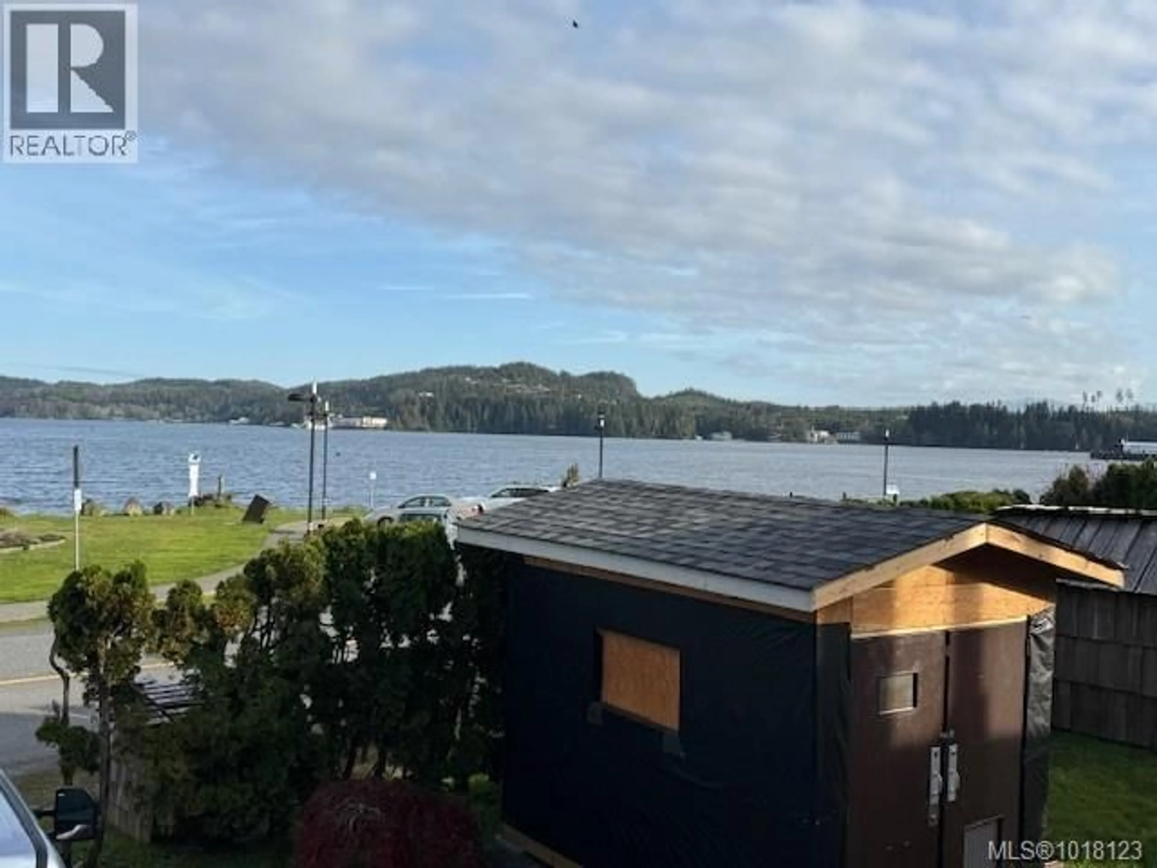 A pic from outside/outdoor area/front of a property/back of a property/a pic from drone, water/lake/river/ocean view for 7550 MARKET STREET, Port Hardy British Columbia V0N2P0