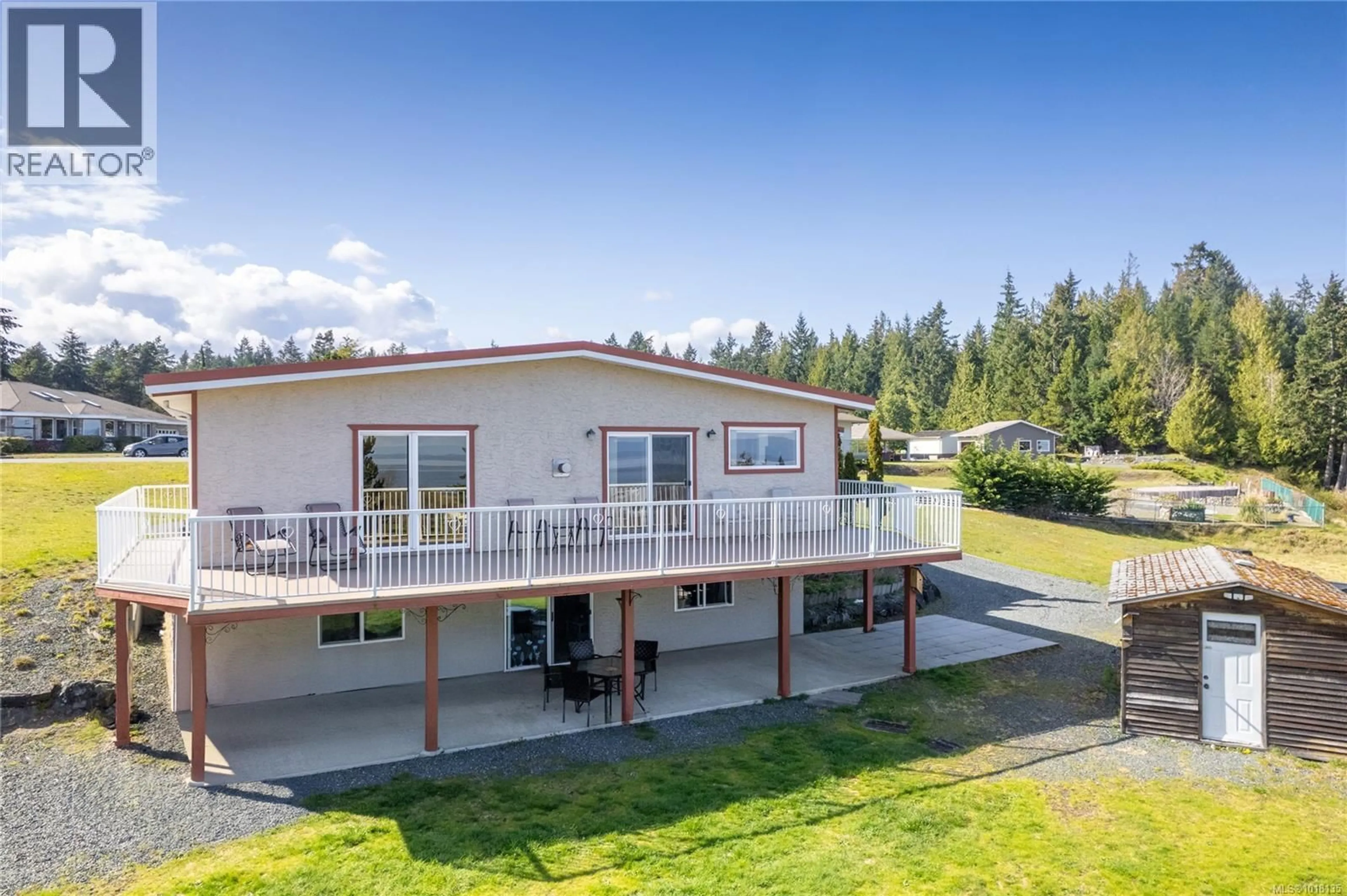 A pic from outside/outdoor area/front of a property/back of a property/a pic from drone, water/lake/river/ocean view for 3021 RAYMUR PLACE, Qualicum Beach British Columbia V9K2N9