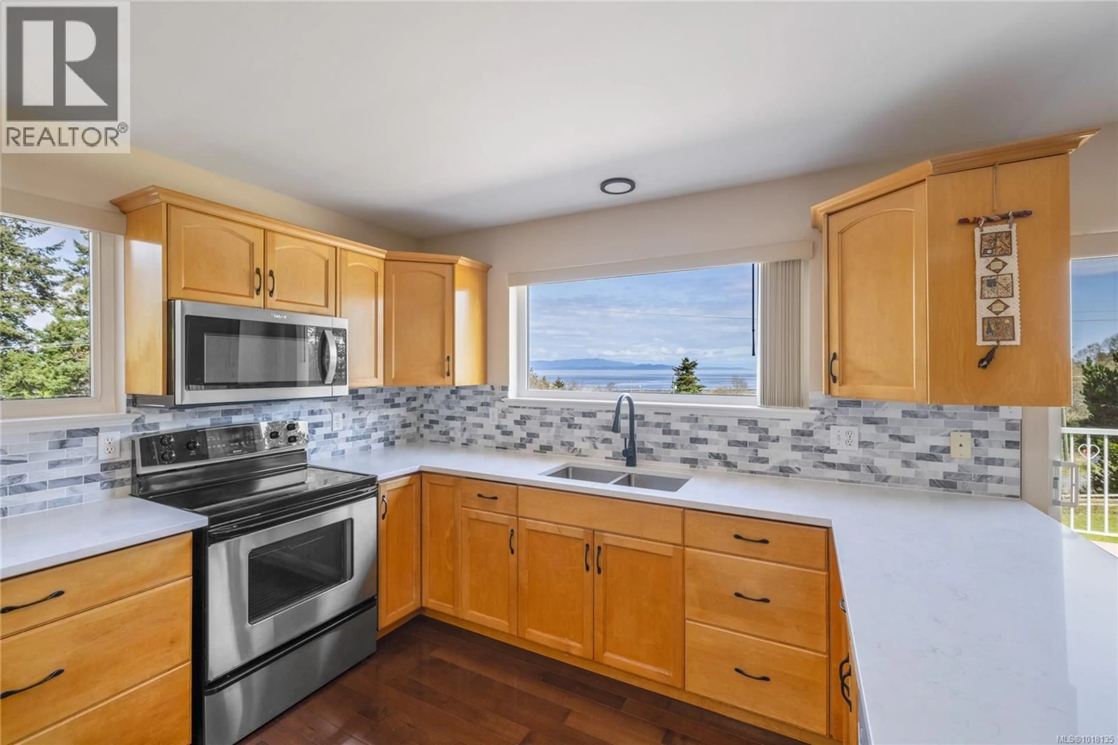 Standard kitchen, ceramic/tile floor for 3021 RAYMUR PLACE, Qualicum Beach British Columbia V9K2N9