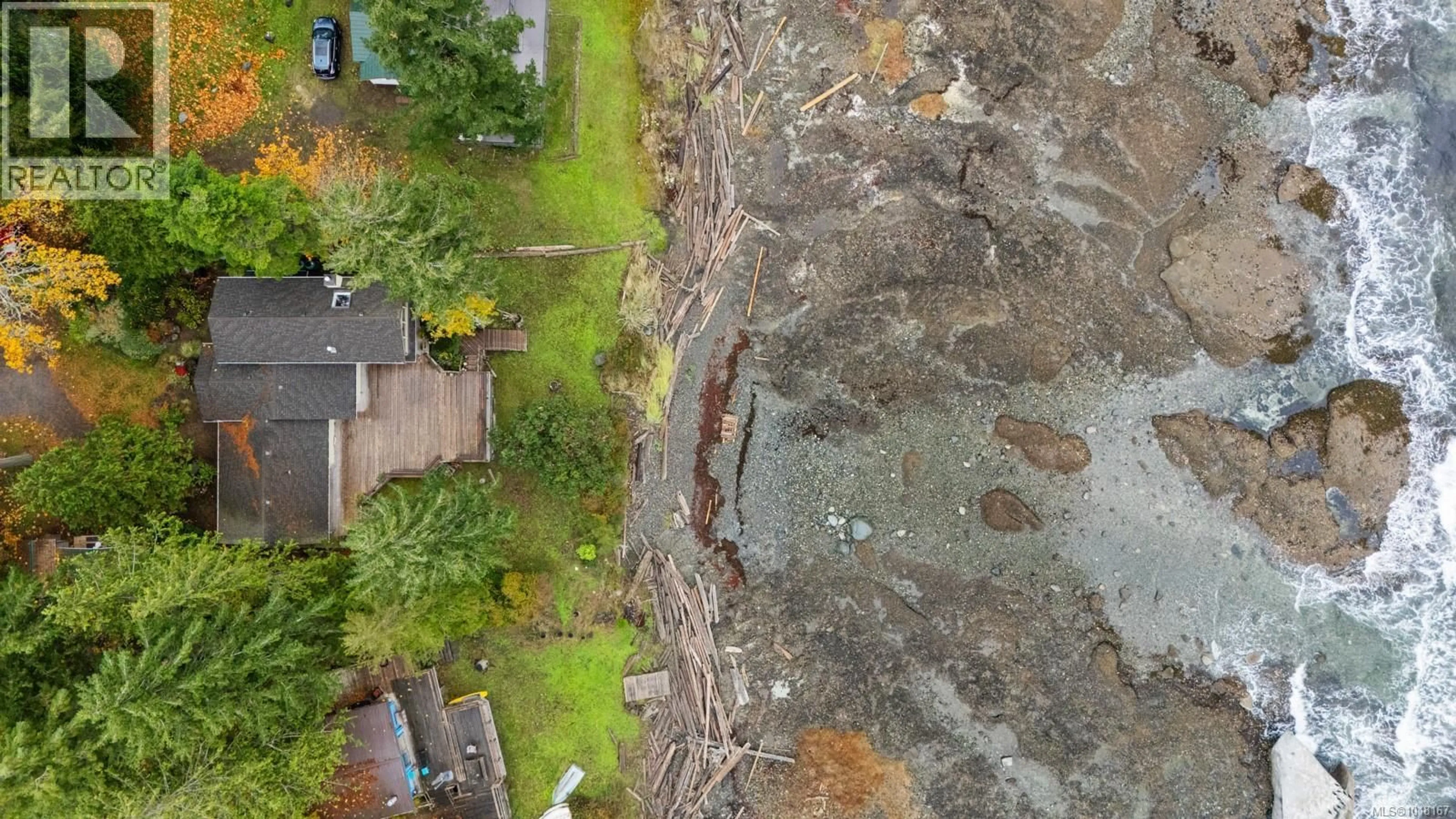 A pic from outside/outdoor area/front of a property/back of a property/a pic from drone, street for 3495 HARWOOD ROAD, Hornby Island British Columbia V0R1Z0