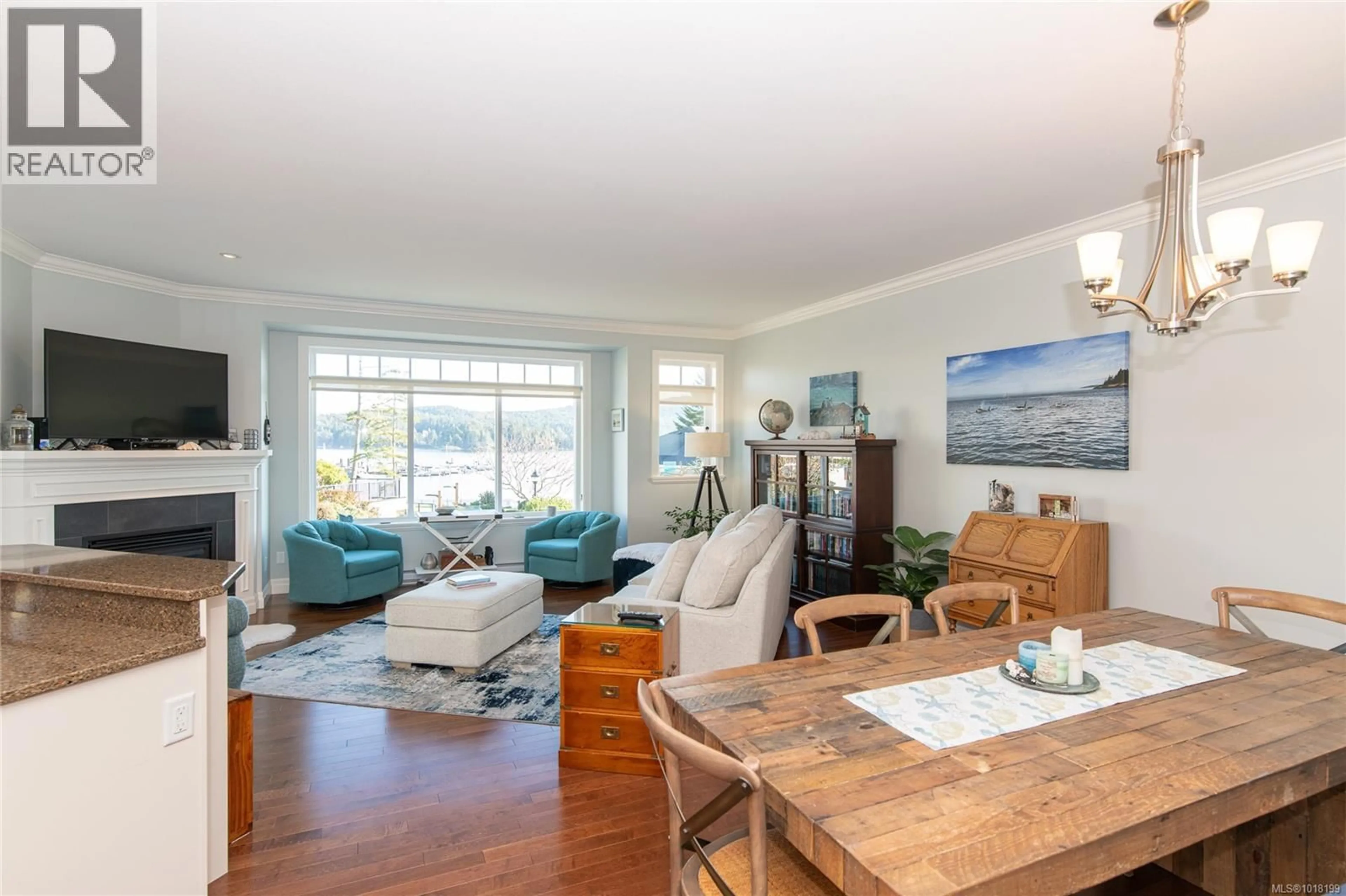 Living room with furniture, wood/laminate floor for 10 - 6995 NORDIN ROAD, Sooke British Columbia V9Z1L4