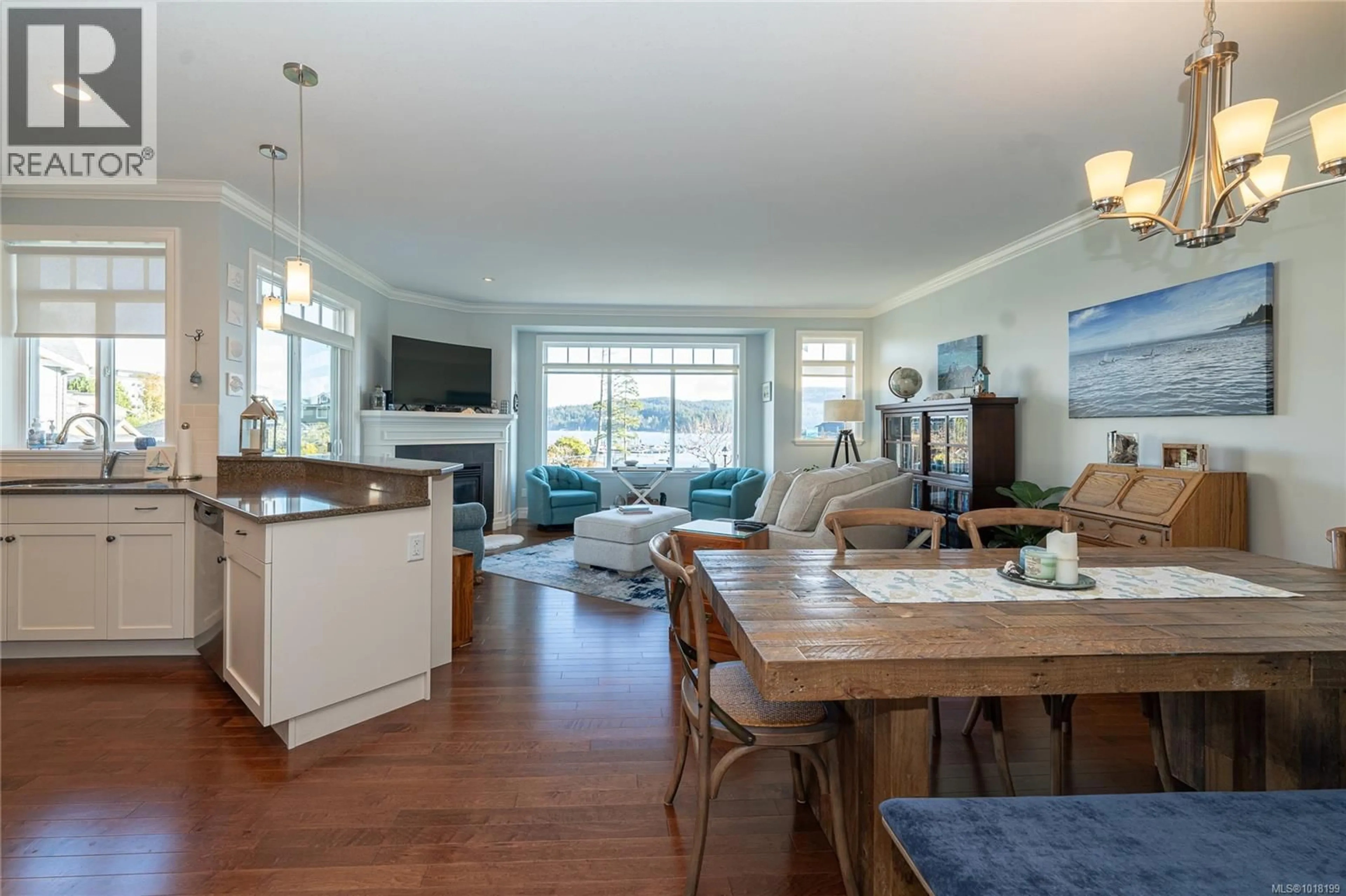 Open concept kitchen, wood/laminate floor for 10 - 6995 NORDIN ROAD, Sooke British Columbia V9Z1L4