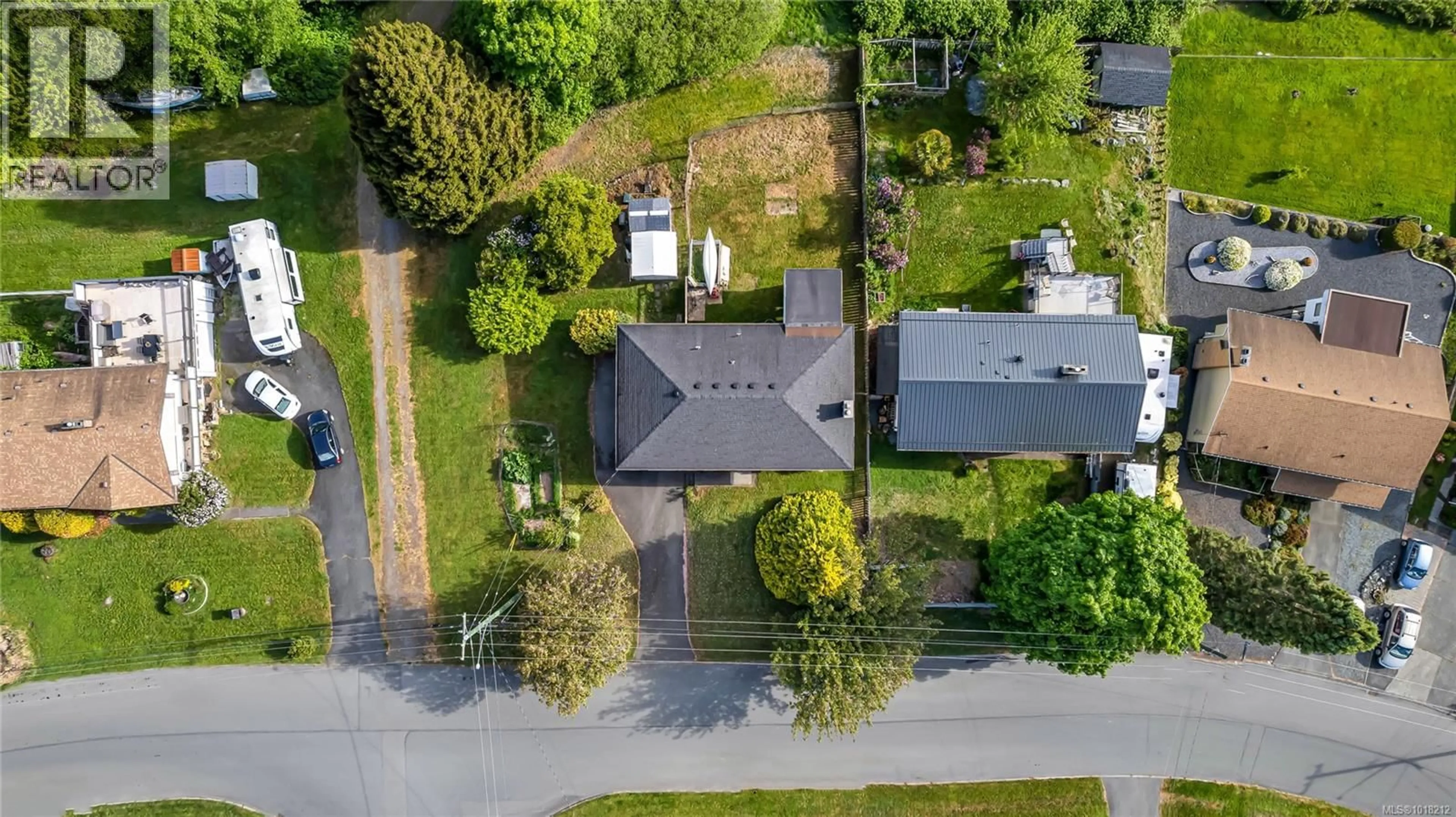 A pic from outside/outdoor area/front of a property/back of a property/a pic from drone, street for 242 PORTSMOUTH DRIVE, Colwood British Columbia V9C1R9