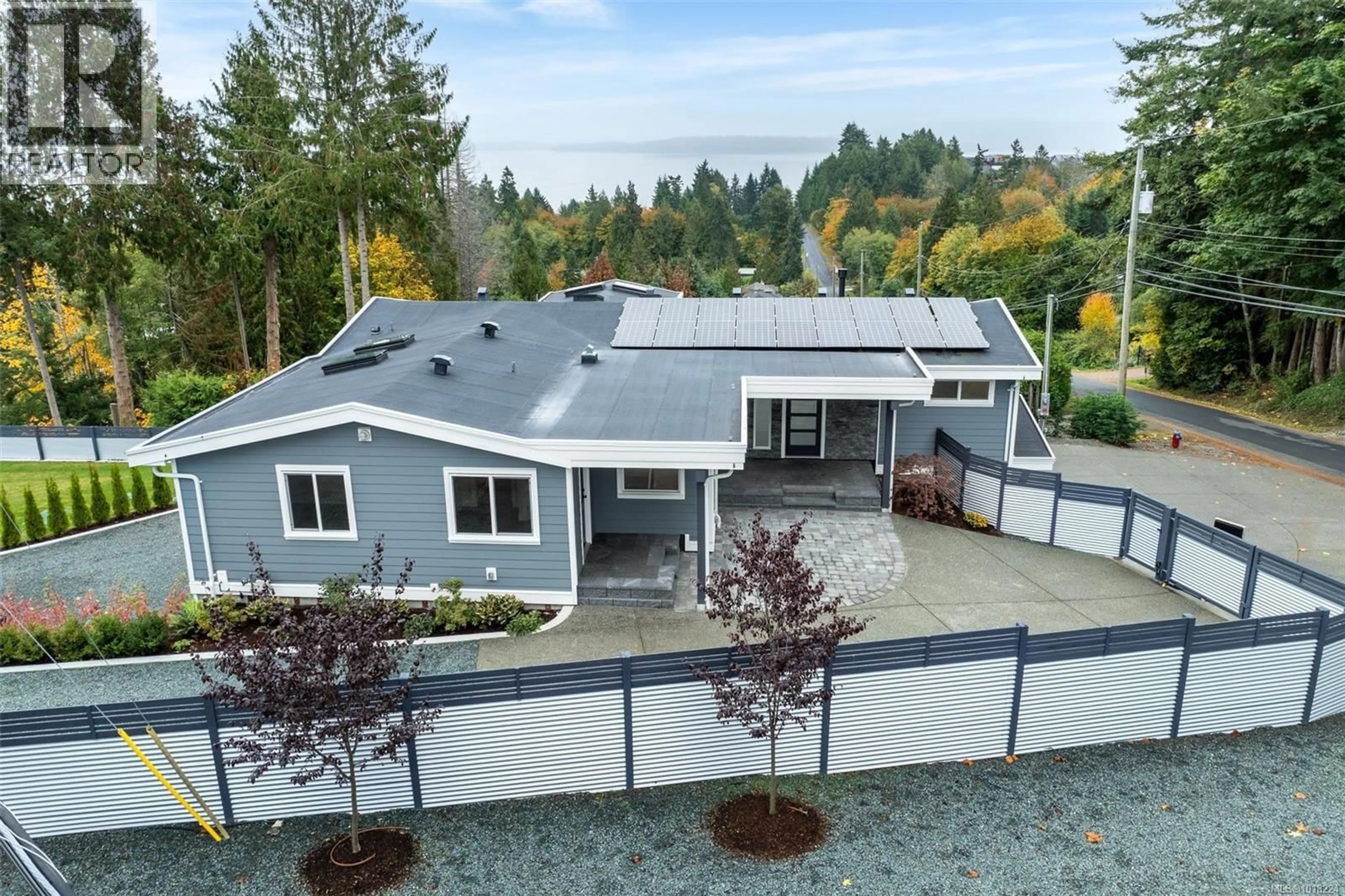 A pic from outside/outdoor area/front of a property/back of a property/a pic from drone, unknown for 667 NOOWICK ROAD, Mill Bay British Columbia V8H1G5