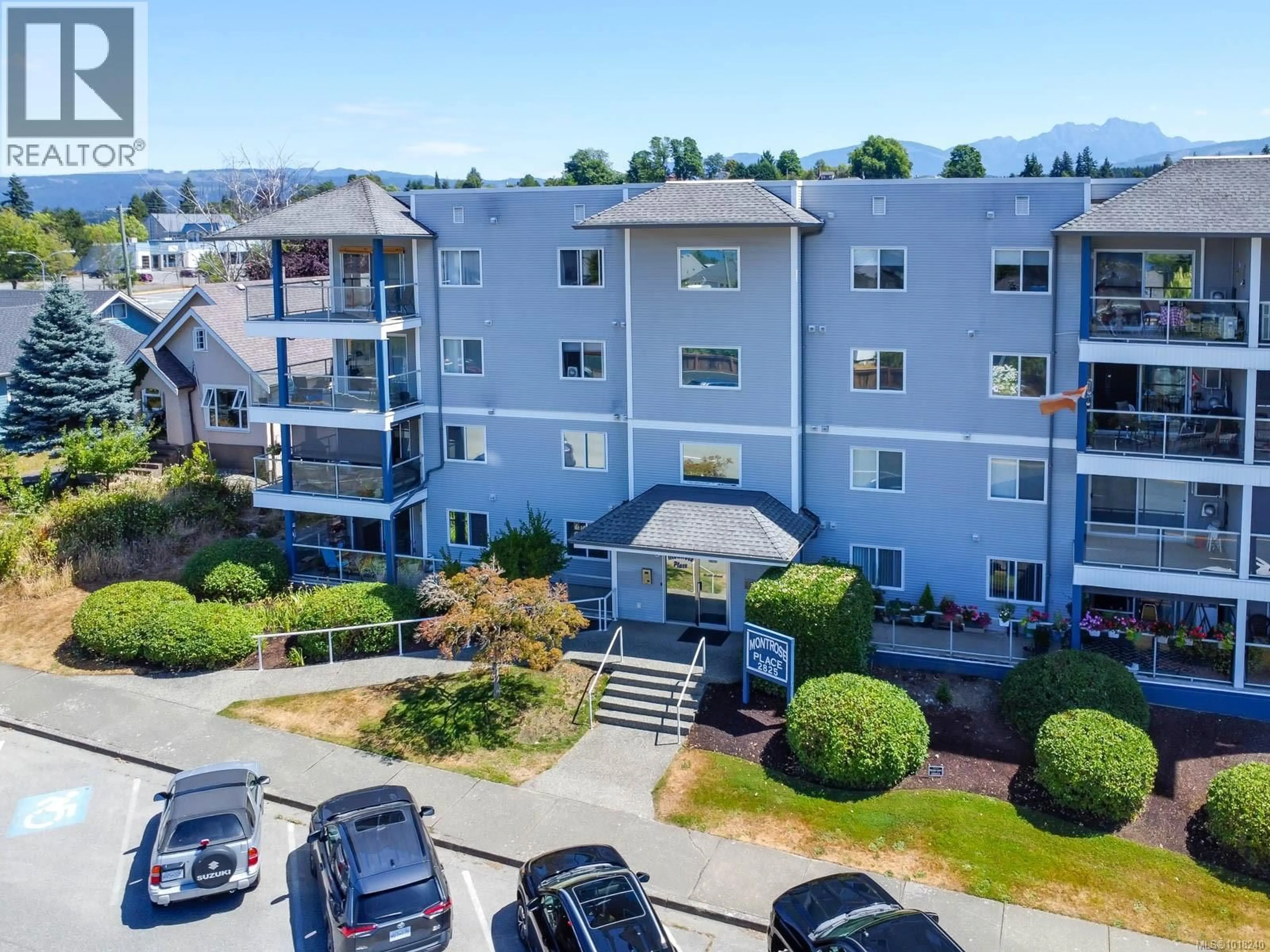 A pic from outside/outdoor area/front of a property/back of a property/a pic from drone, mountain view for 303 - 2825 3RD AVENUE, Port Alberni British Columbia V9Y2A9