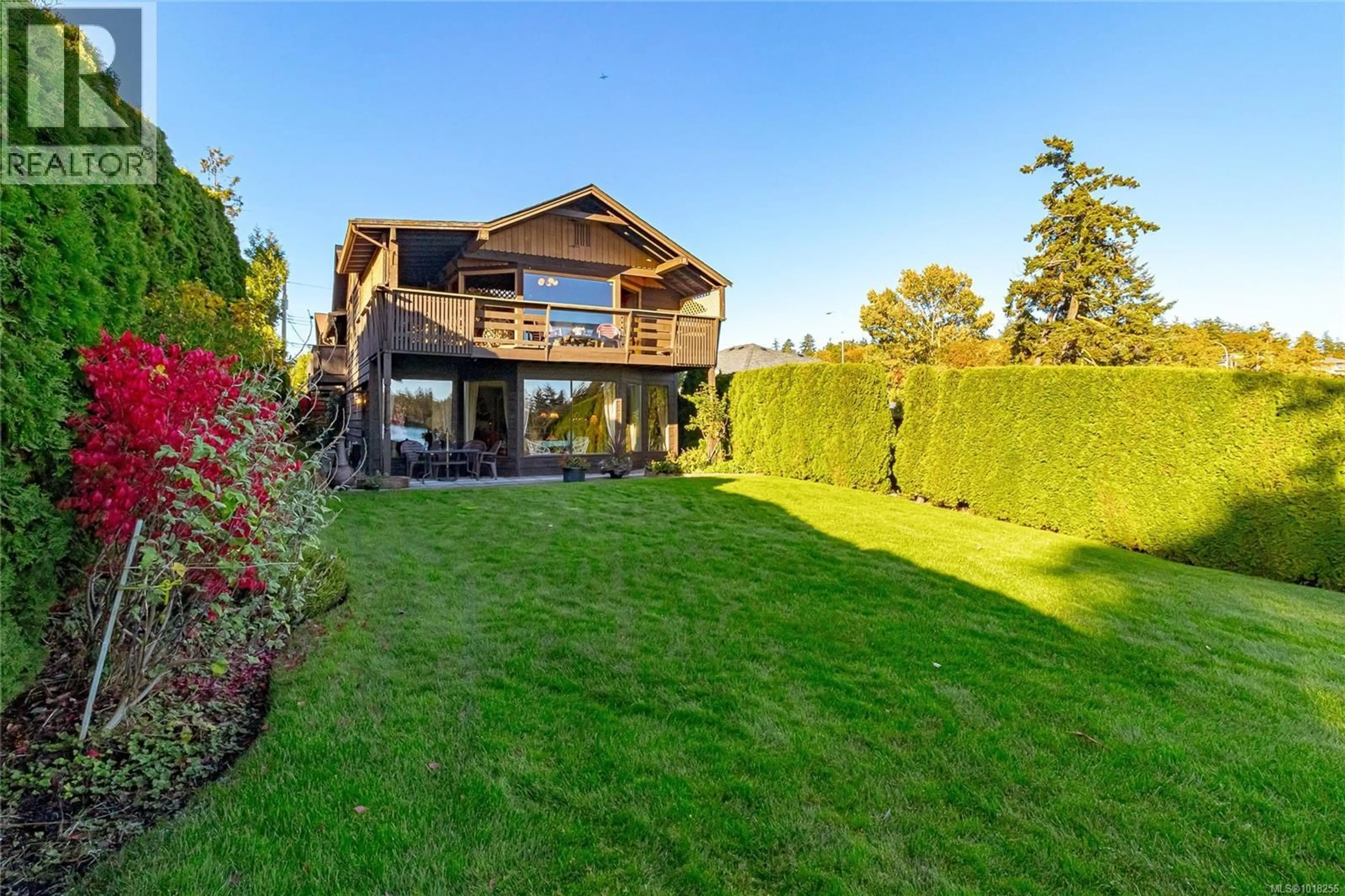 A pic from outside/outdoor area/front of a property/back of a property/a pic from drone, water/lake/river/ocean view for A - 128 ST. GILES STREET, View Royal British Columbia V8Z5E5