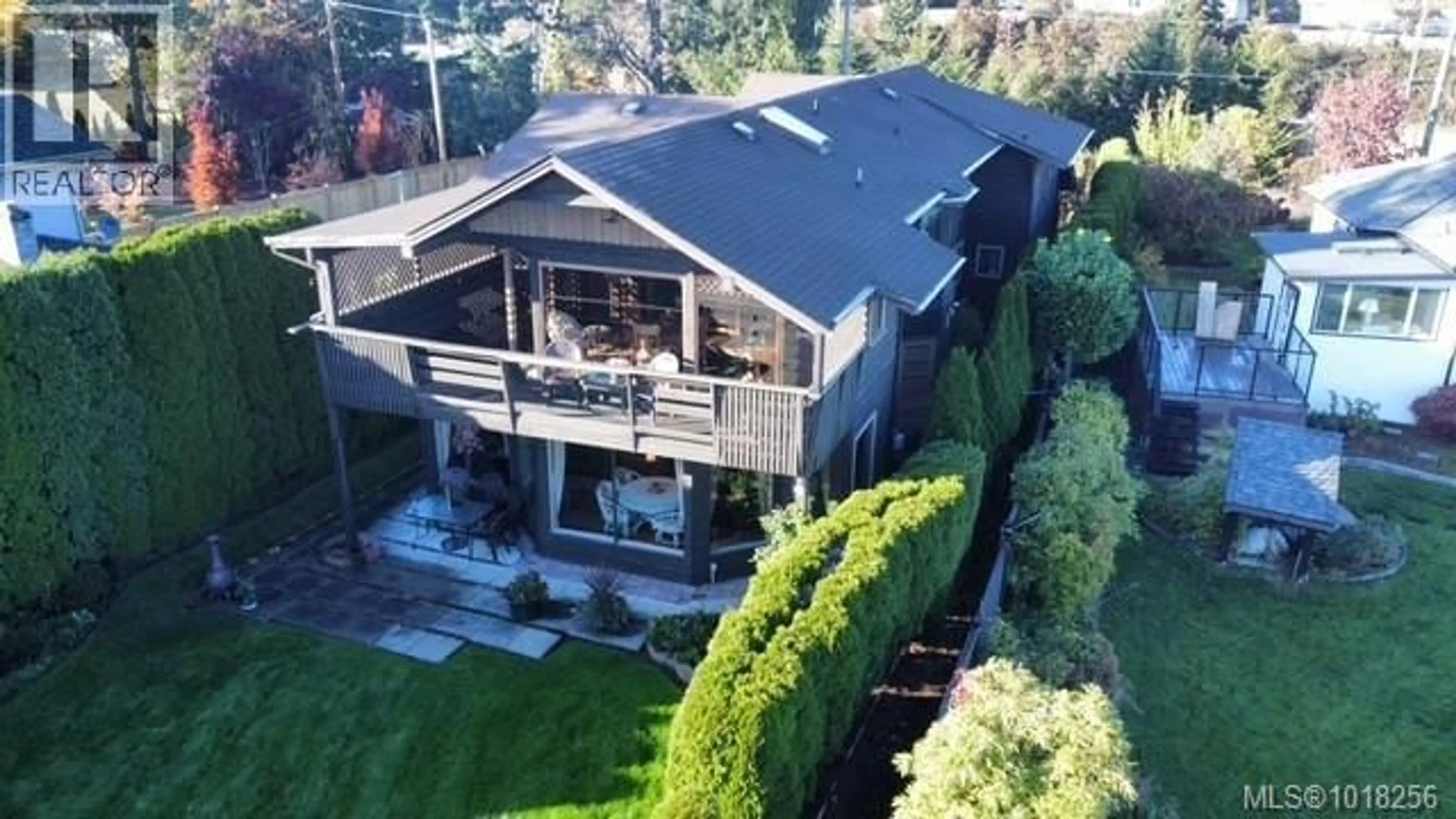 A pic from outside/outdoor area/front of a property/back of a property/a pic from drone, unknown for A - 128 ST. GILES STREET, View Royal British Columbia V8Z5E5
