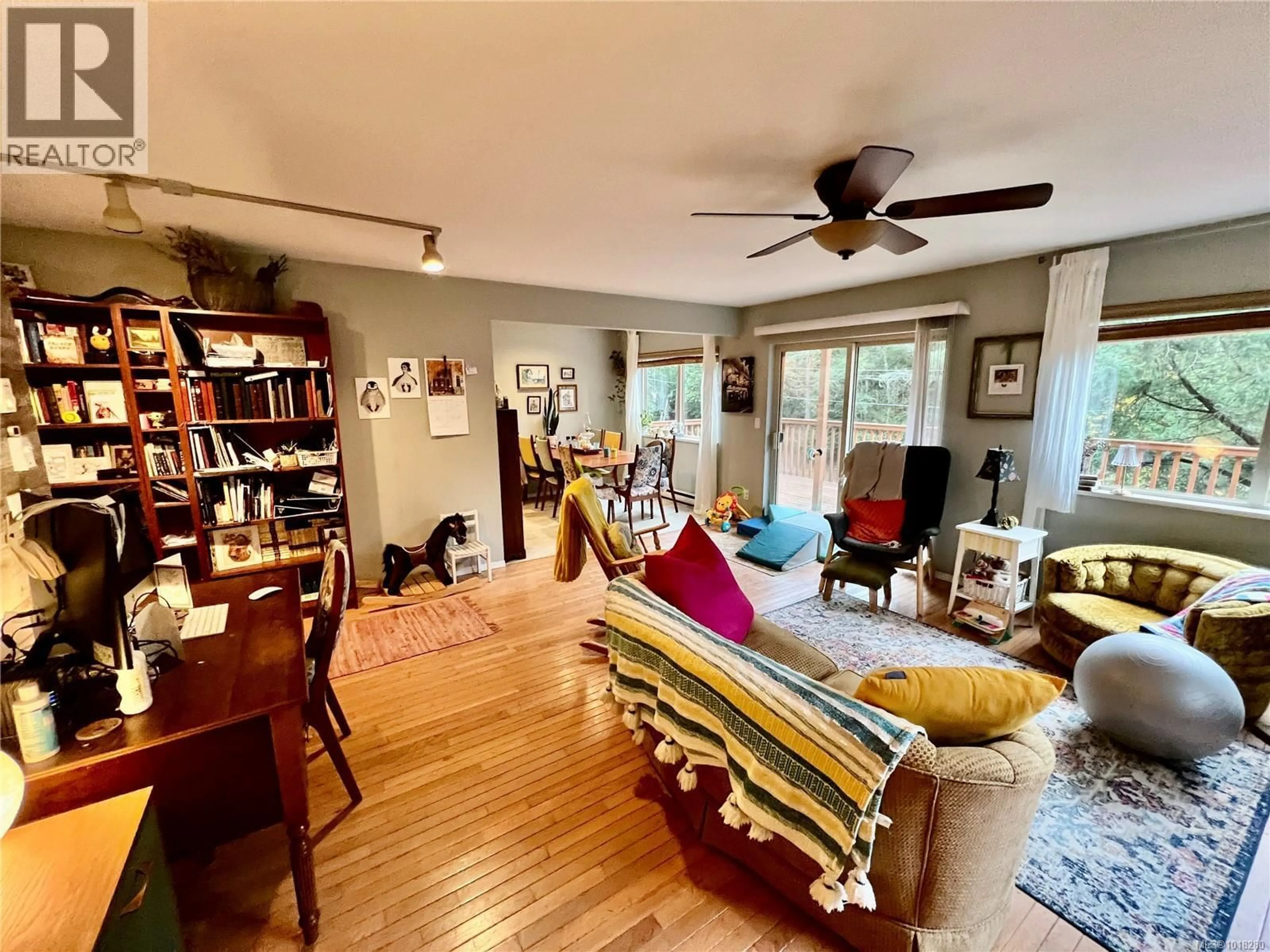 Living room with furniture, unknown for 702 CHARTER ROAD, Mayne Island British Columbia V0N2J1