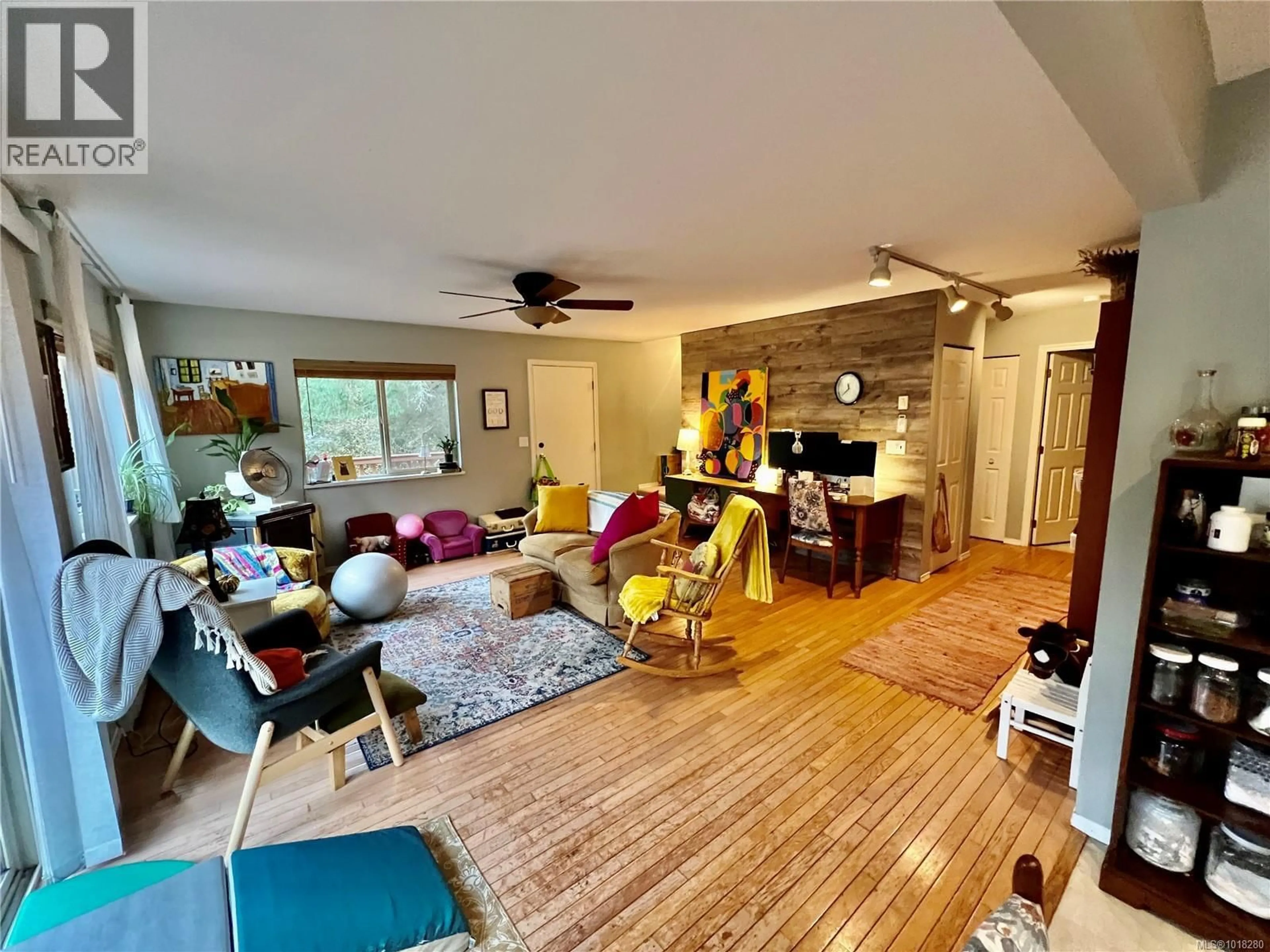Living room with furniture, unknown for 702 CHARTER ROAD, Mayne Island British Columbia V0N2J1
