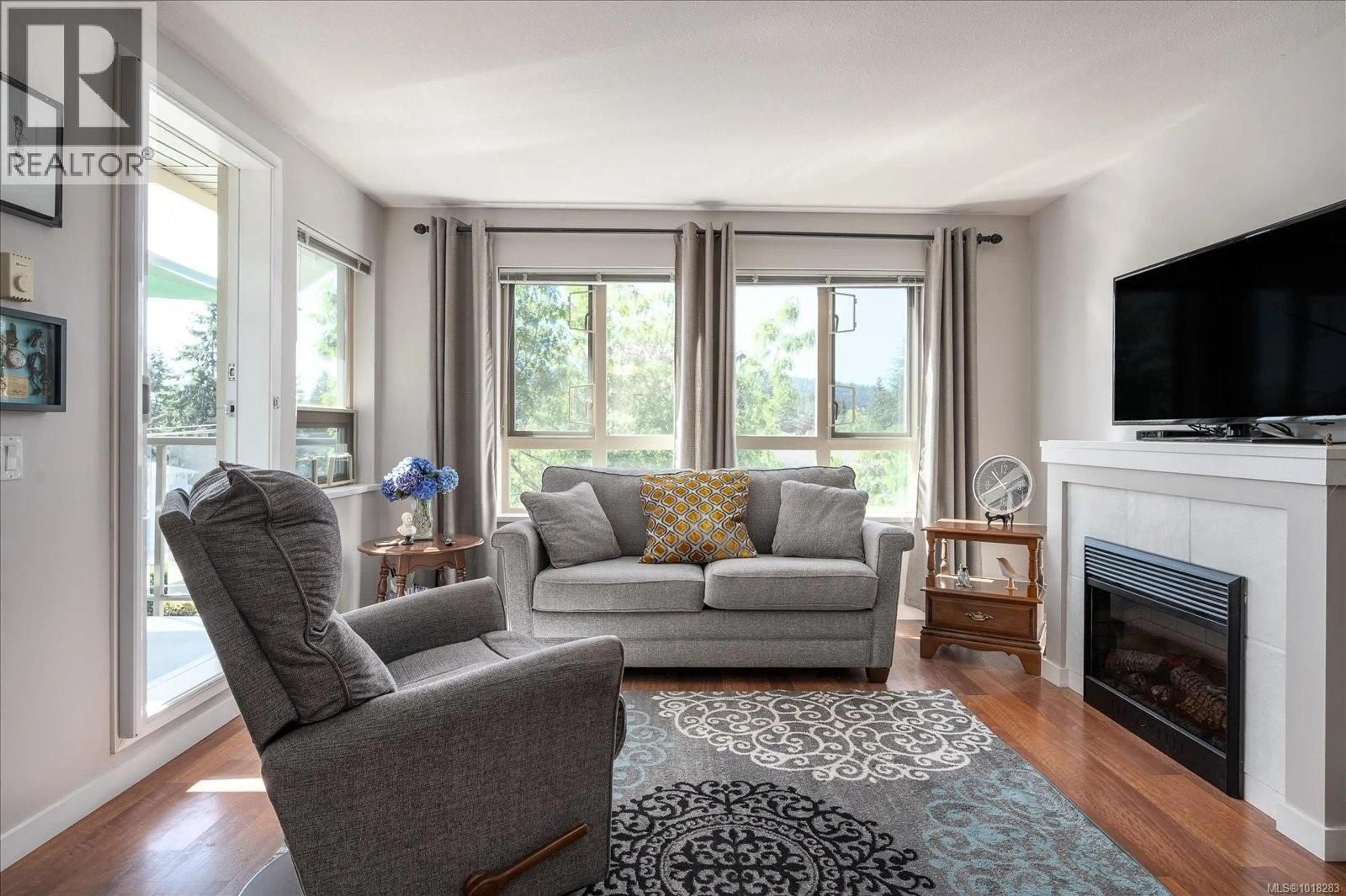 Living room with furniture, unknown for 404 - 297 HIRST AVENUE WEST, Parksville British Columbia V9P0A4