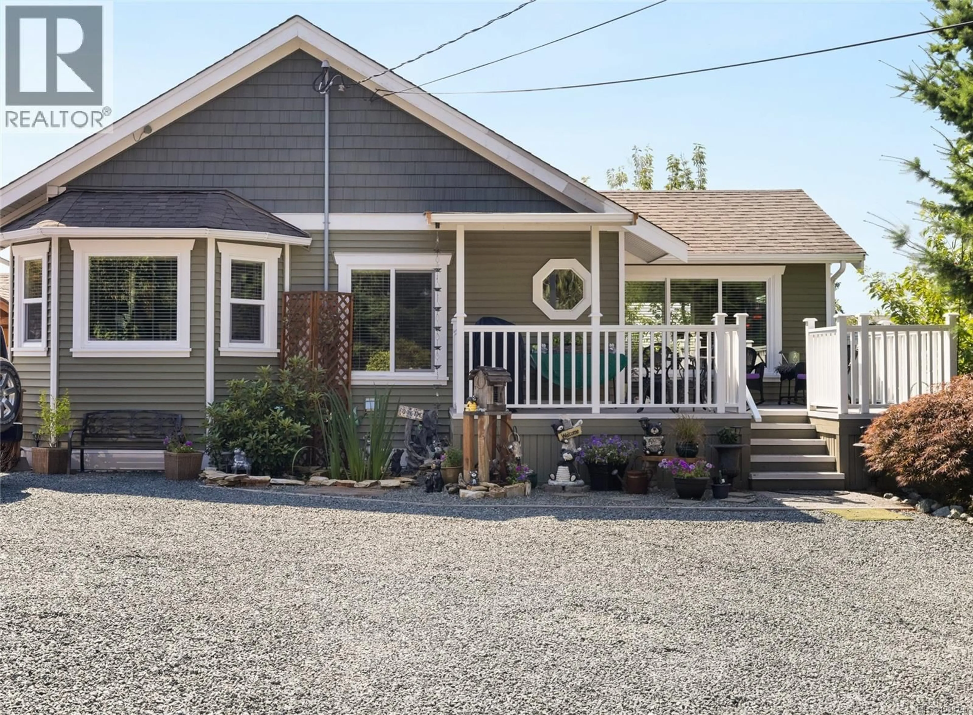 Home with vinyl exterior material, street for 1988 MAPLE BAY ROAD, Duncan British Columbia V9L5M3