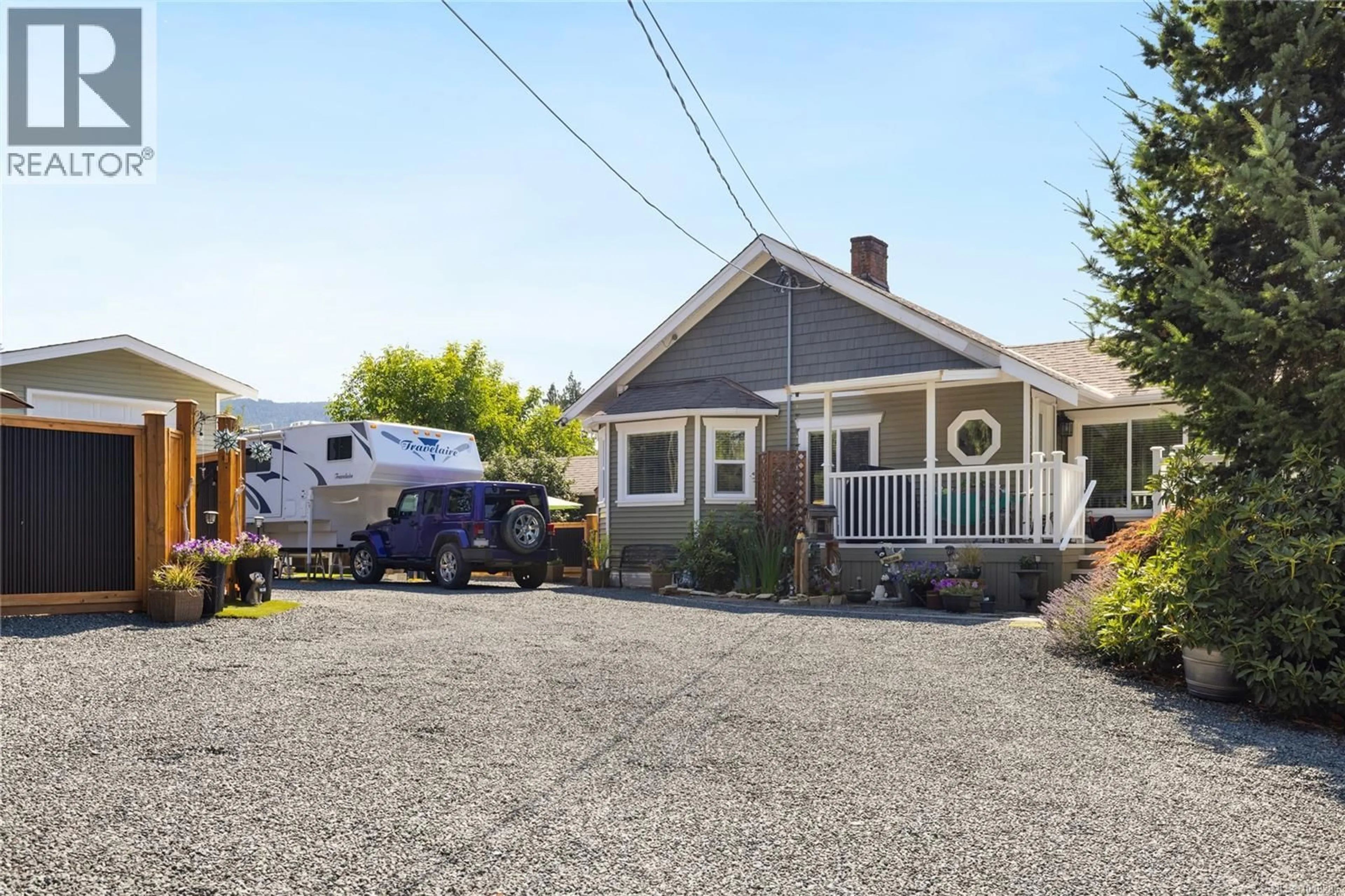 A pic from outside/outdoor area/front of a property/back of a property/a pic from drone, street for 1988 MAPLE BAY ROAD, Duncan British Columbia V9L5M3