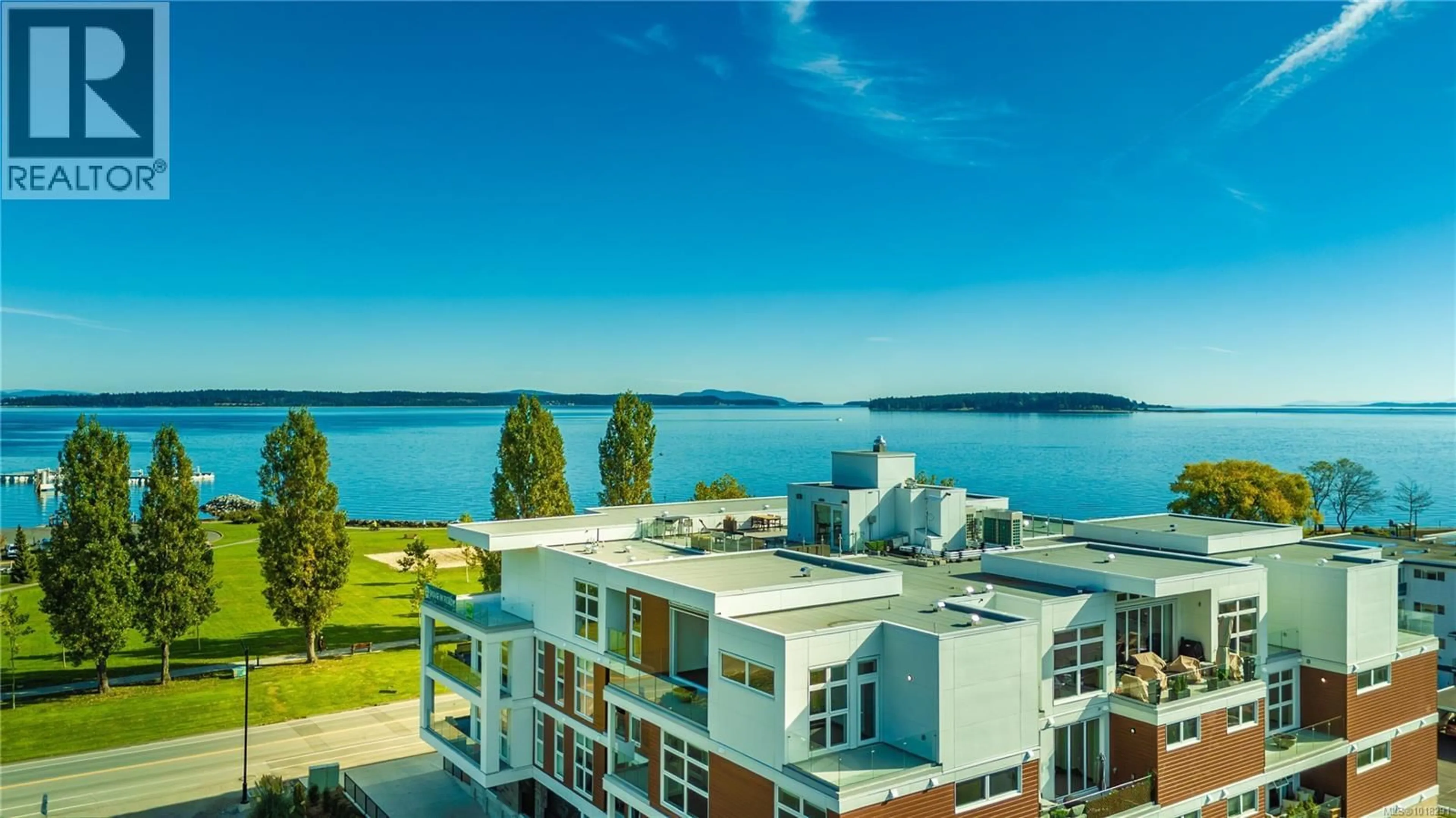 A pic from outside/outdoor area/front of a property/back of a property/a pic from drone, water/lake/river/ocean view for 403 - 9570 FIFTH STREET, Sidney British Columbia V8L2W5