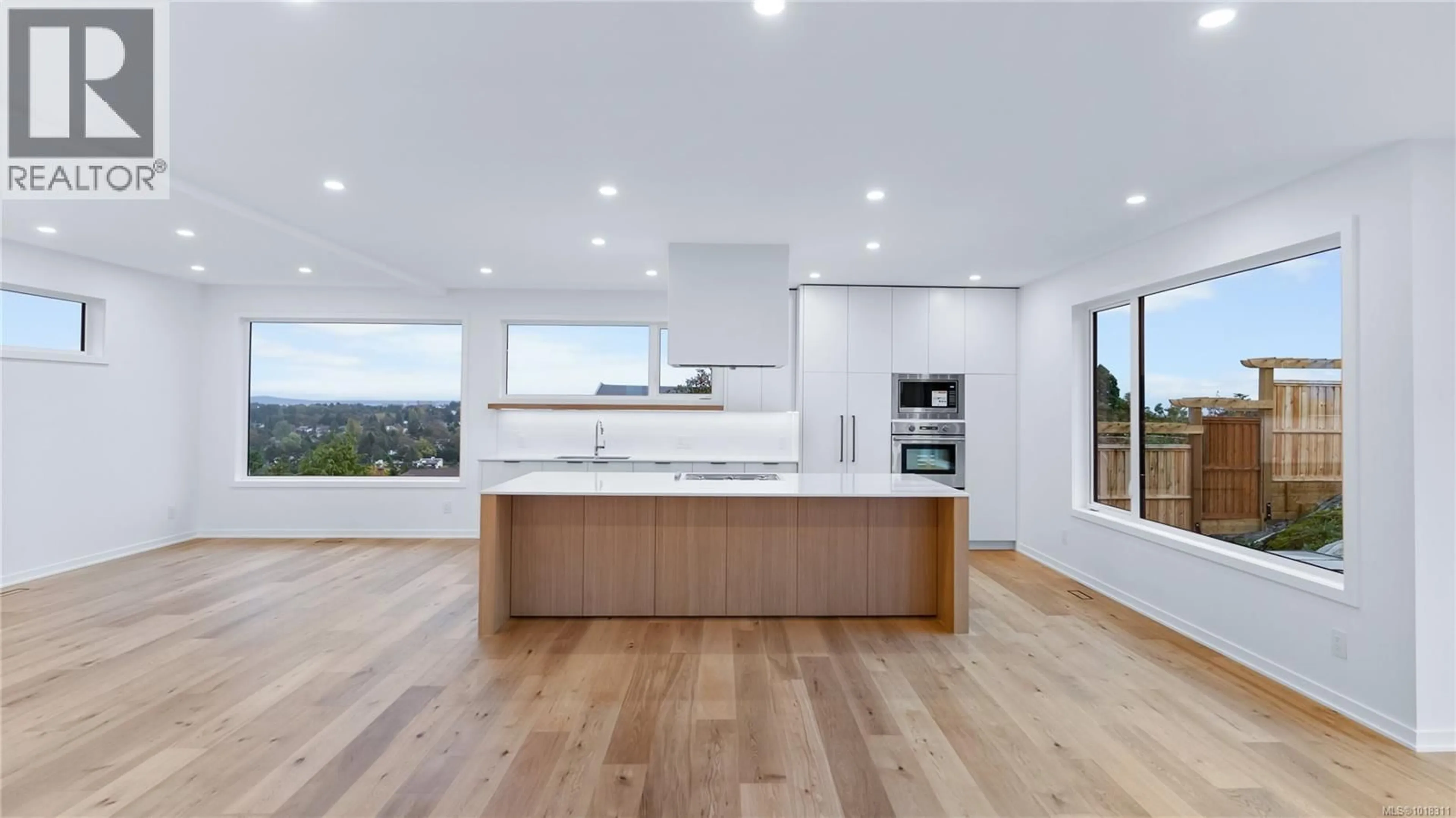 Open concept kitchen, wood/laminate floor for 3700 KOOTENAY PLACE, Saanich British Columbia V8P2G2