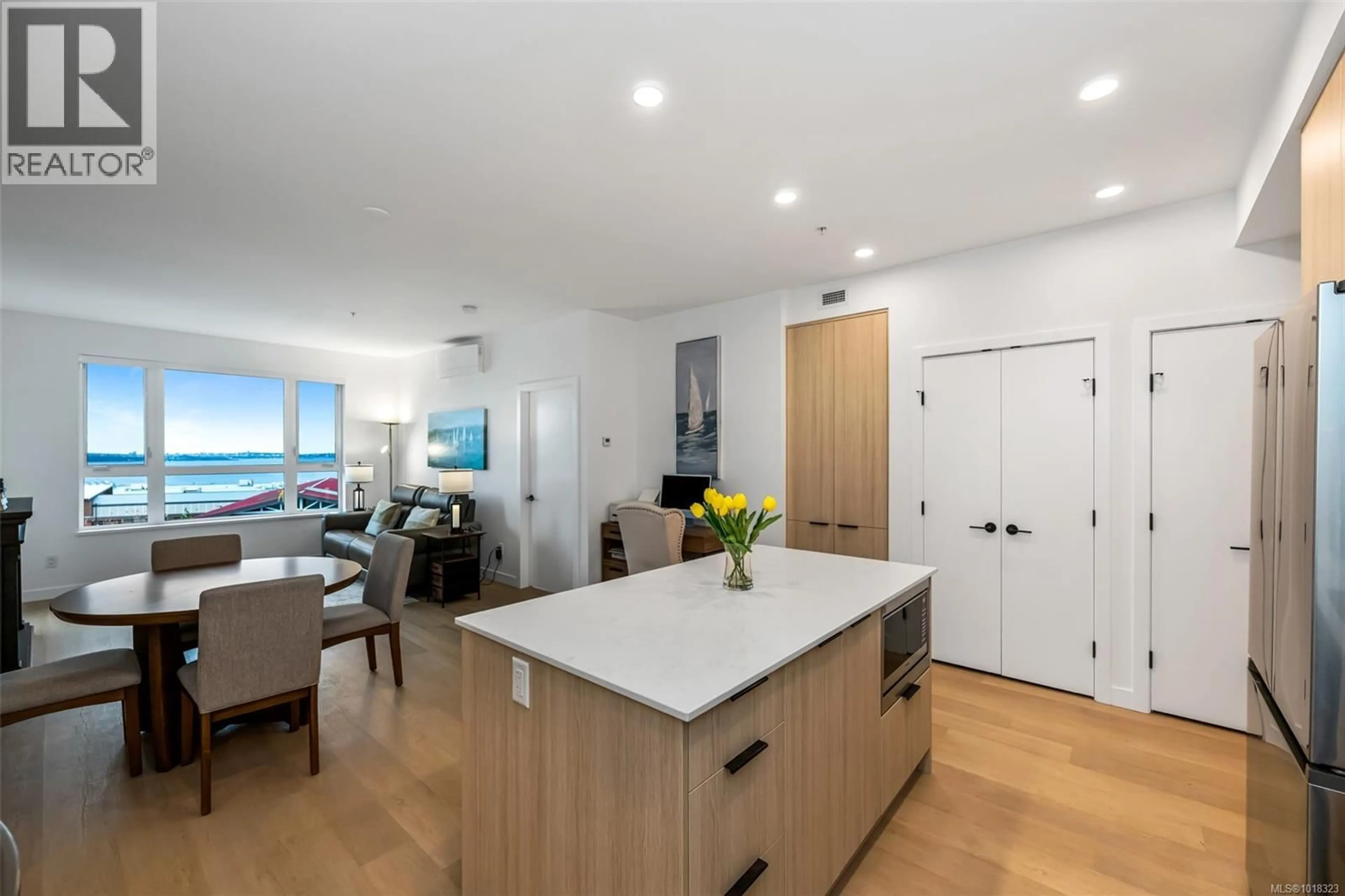 Open concept kitchen, unknown for 411 - 3564A RYDER HESJEDAL WAY, Colwood British Columbia V9C0V3