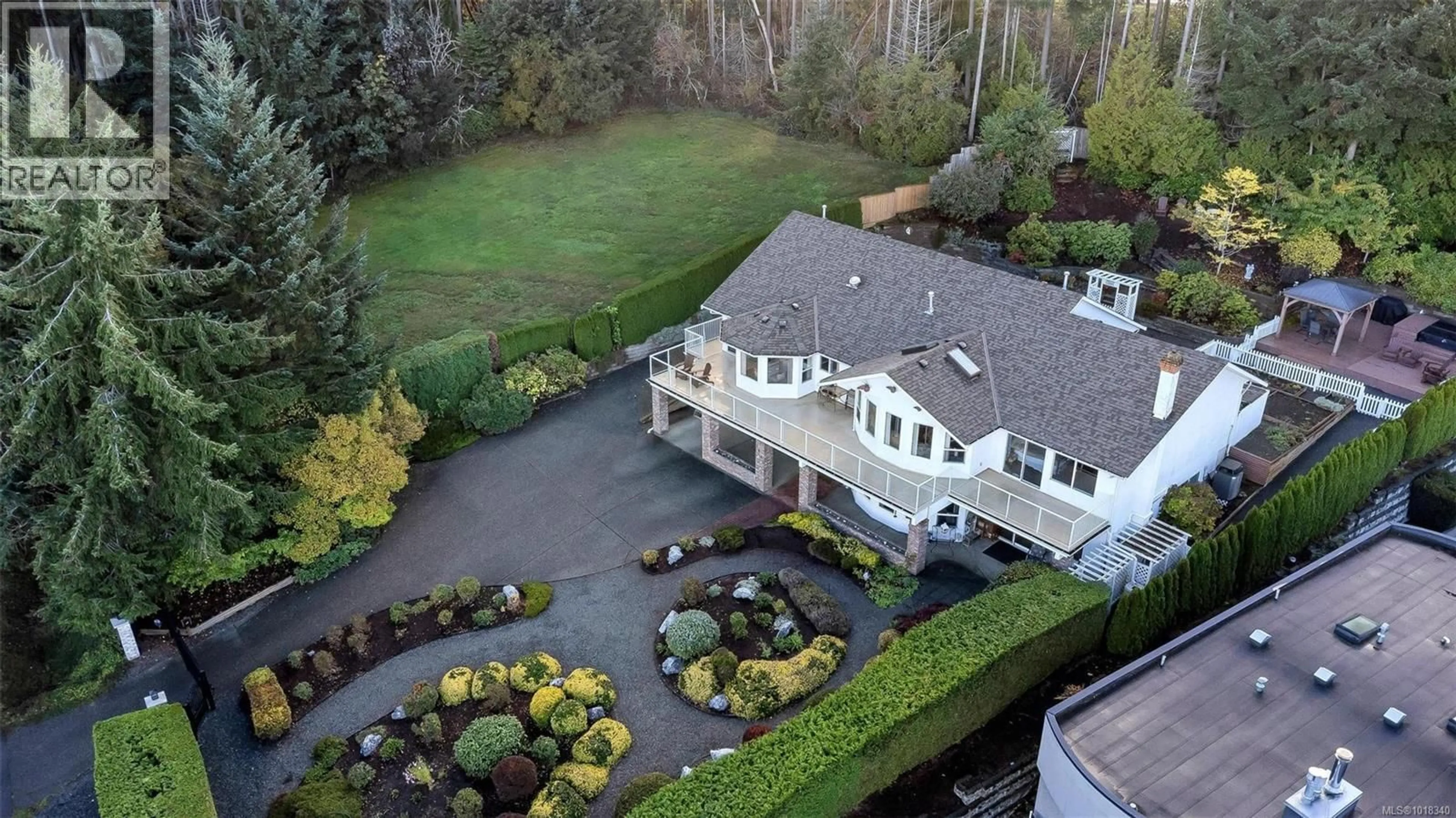 A pic from outside/outdoor area/front of a property/back of a property/a pic from drone, unknown for 2446 LIGGETT ROAD, Mill Bay British Columbia V8H1C2