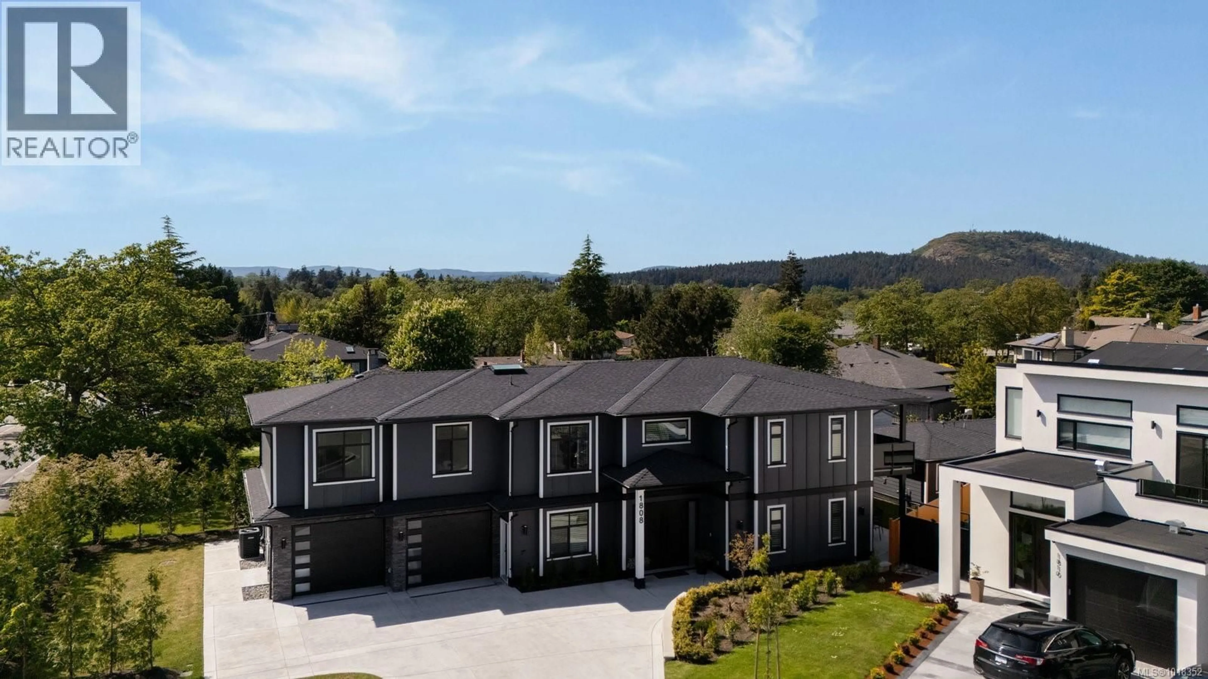 A pic from outside/outdoor area/front of a property/back of a property/a pic from drone, mountain view for 1808 FELTHAM ROAD, Saanich British Columbia V8N2A6