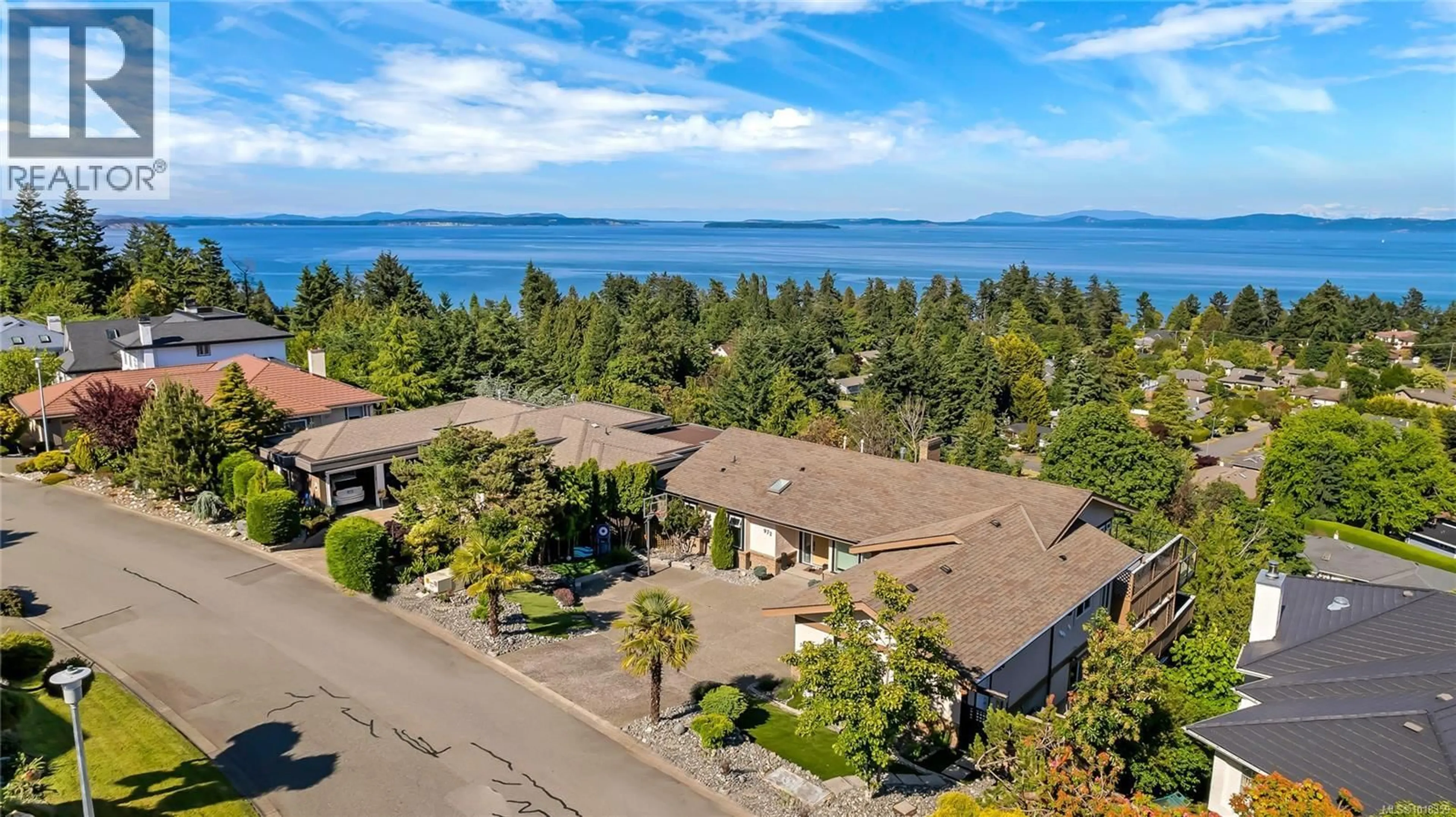 A pic from outside/outdoor area/front of a property/back of a property/a pic from drone, water/lake/river/ocean view for 972 SEAPEARL PLACE, Saanich British Columbia V8Y2X2