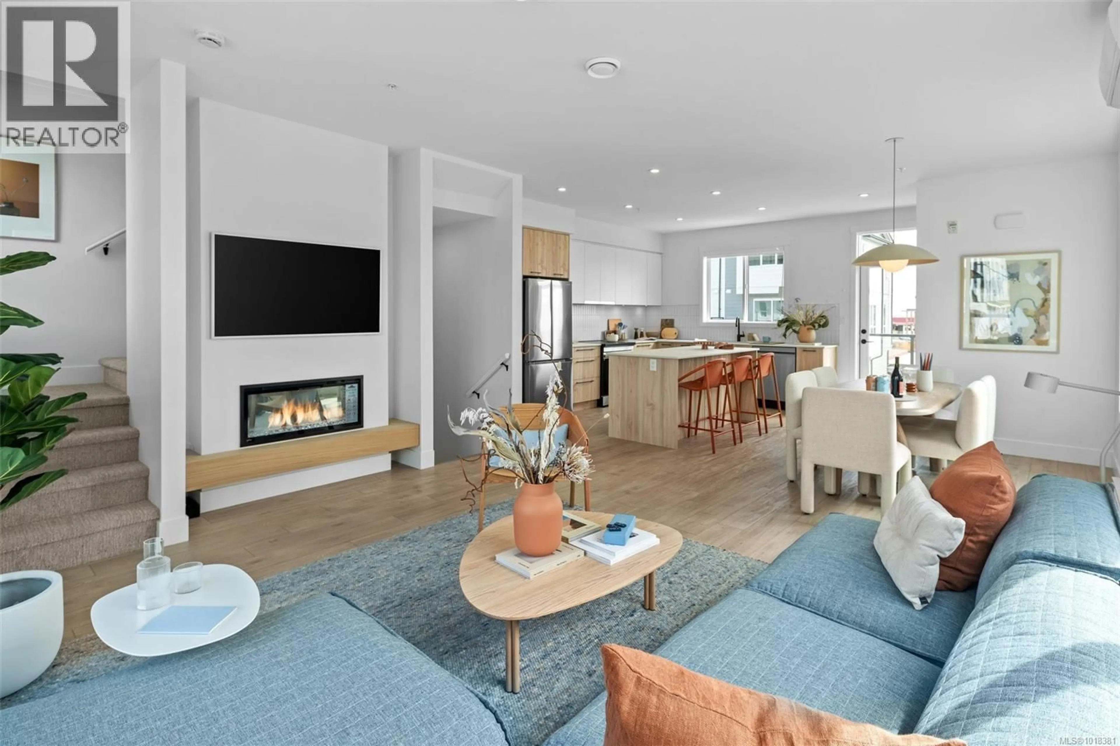 Living room with furniture, ceramic/tile floor for 108 - 368 TRADEWINDS AVENUE, Colwood British Columbia V9C0S5