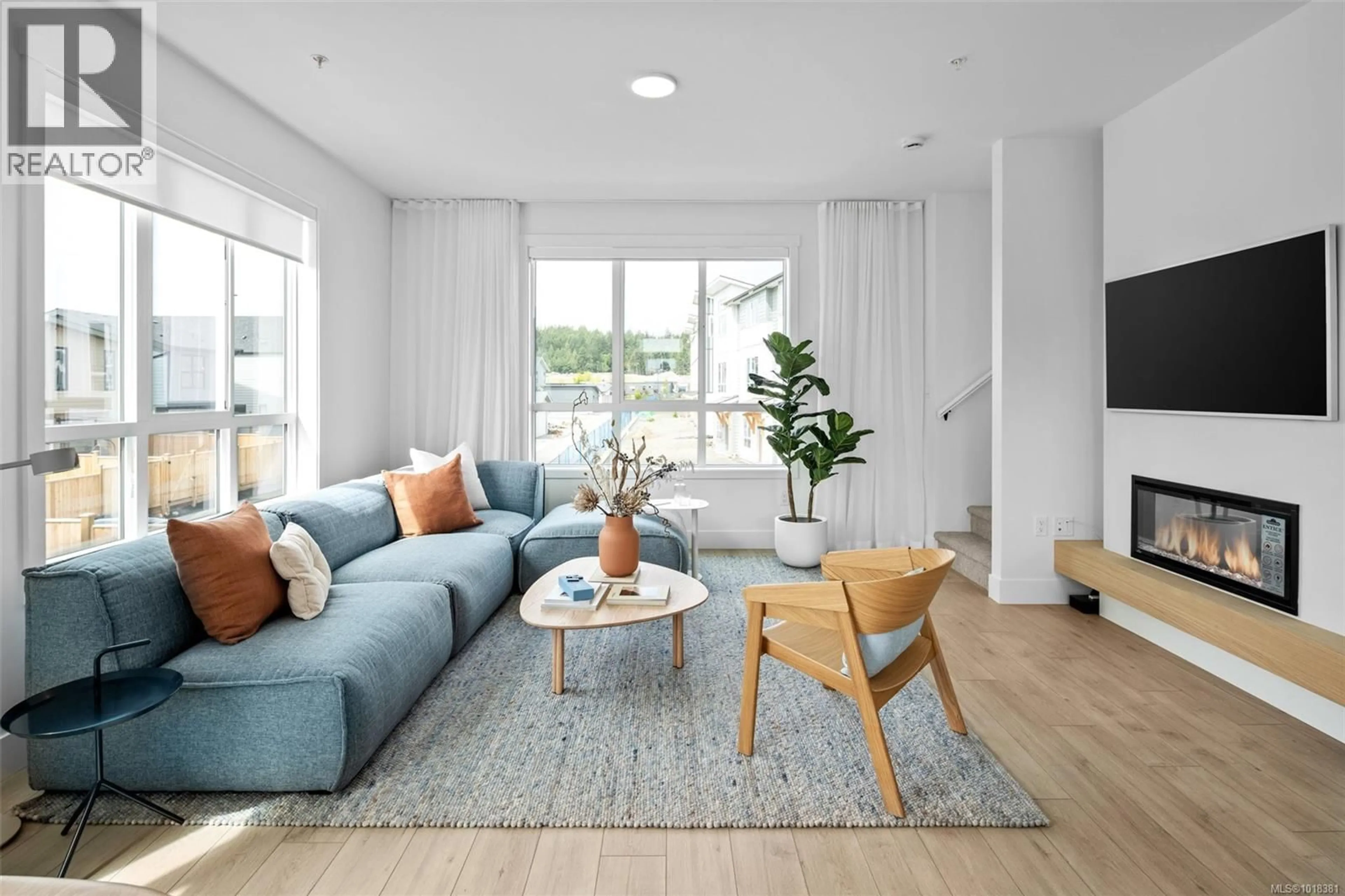 Living room with furniture, unknown for 108 - 368 TRADEWINDS AVENUE, Colwood British Columbia V9C0S5