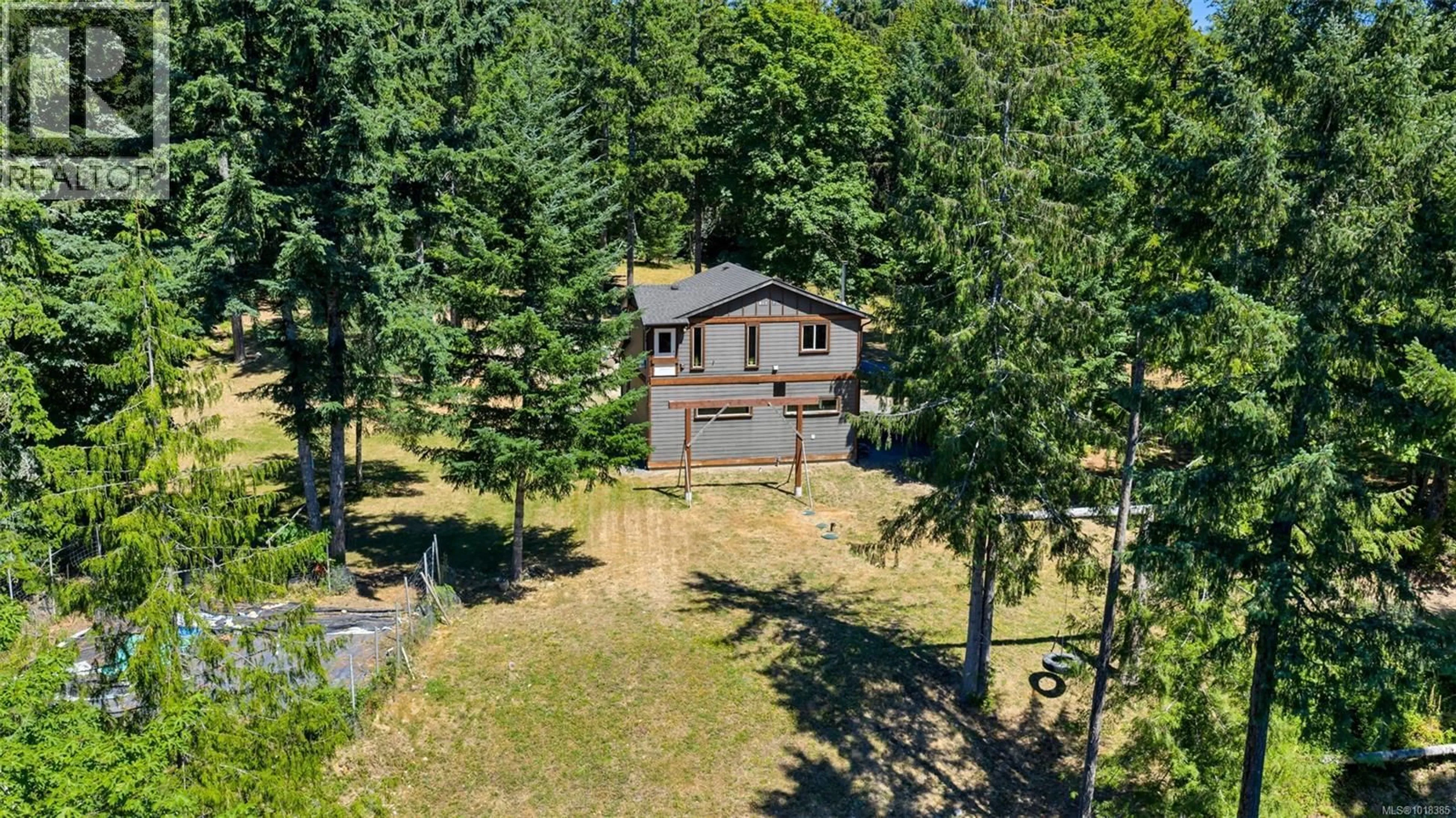 A pic from outside/outdoor area/front of a property/back of a property/a pic from drone, forest/trees view for 4379 IRVINE DRIVE, Duncan British Columbia V9L6G5
