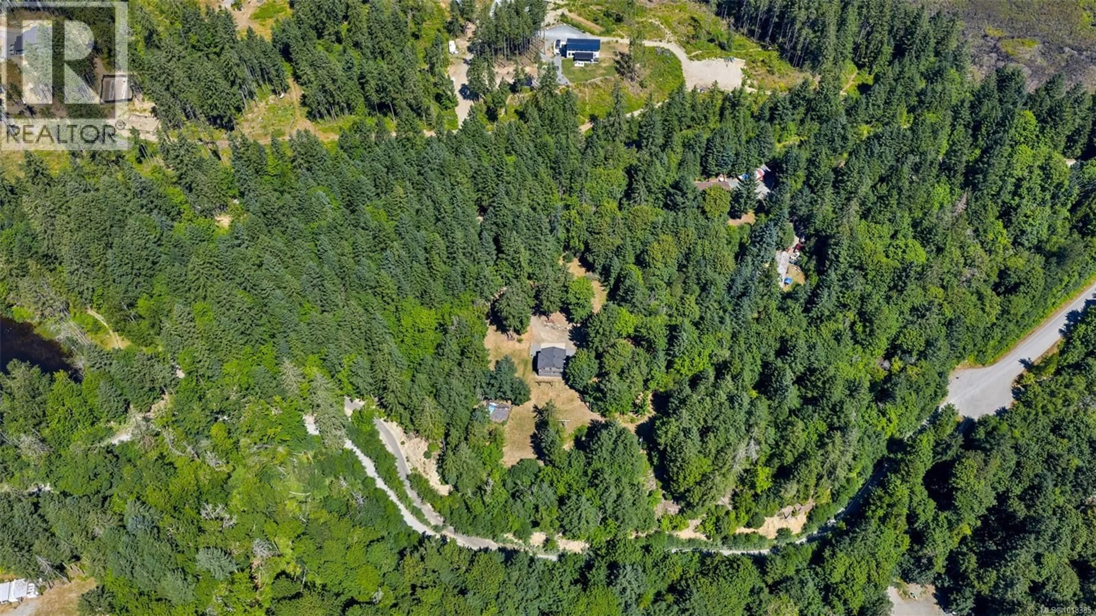 A pic from outside/outdoor area/front of a property/back of a property/a pic from drone, forest/trees view for 4379 IRVINE DRIVE, Duncan British Columbia V9L6G5
