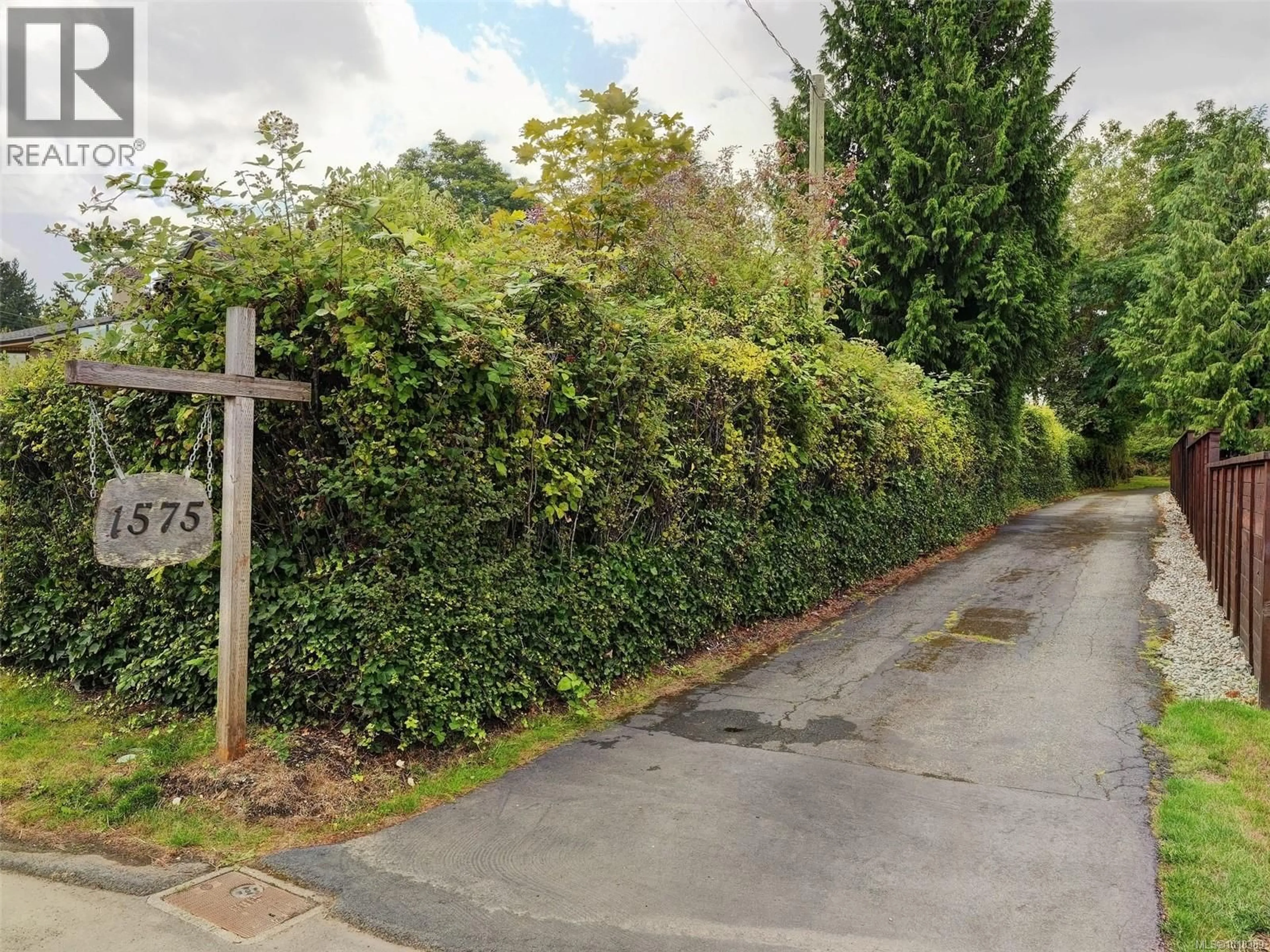 A pic from outside/outdoor area/front of a property/back of a property/a pic from drone, street for 1575 MILEVA LANE, Saanich British Columbia V8N2V6