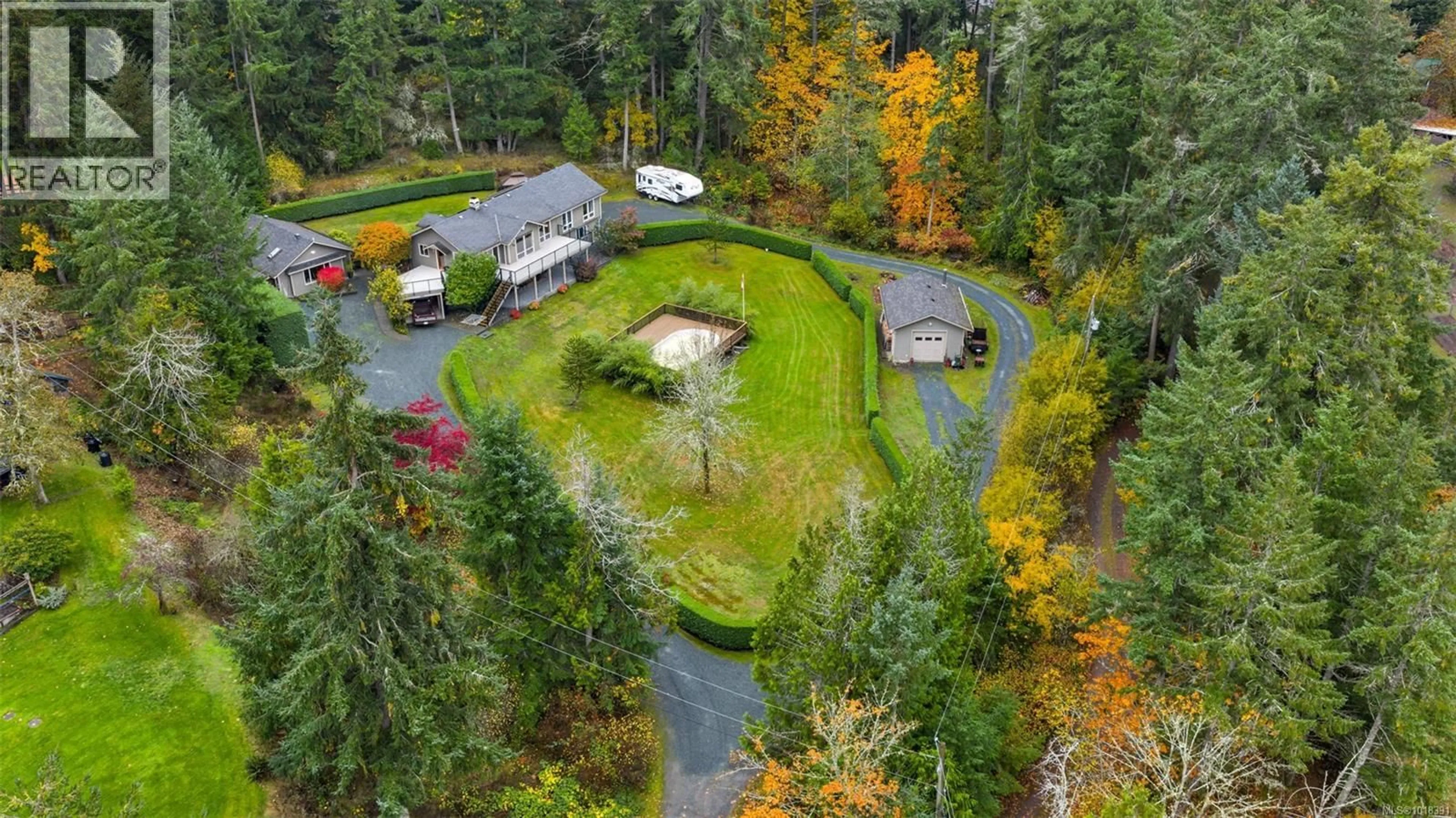 A pic from outside/outdoor area/front of a property/back of a property/a pic from drone, forest/trees view for 1212 BAZETT ROAD, Duncan British Columbia V9L5S8