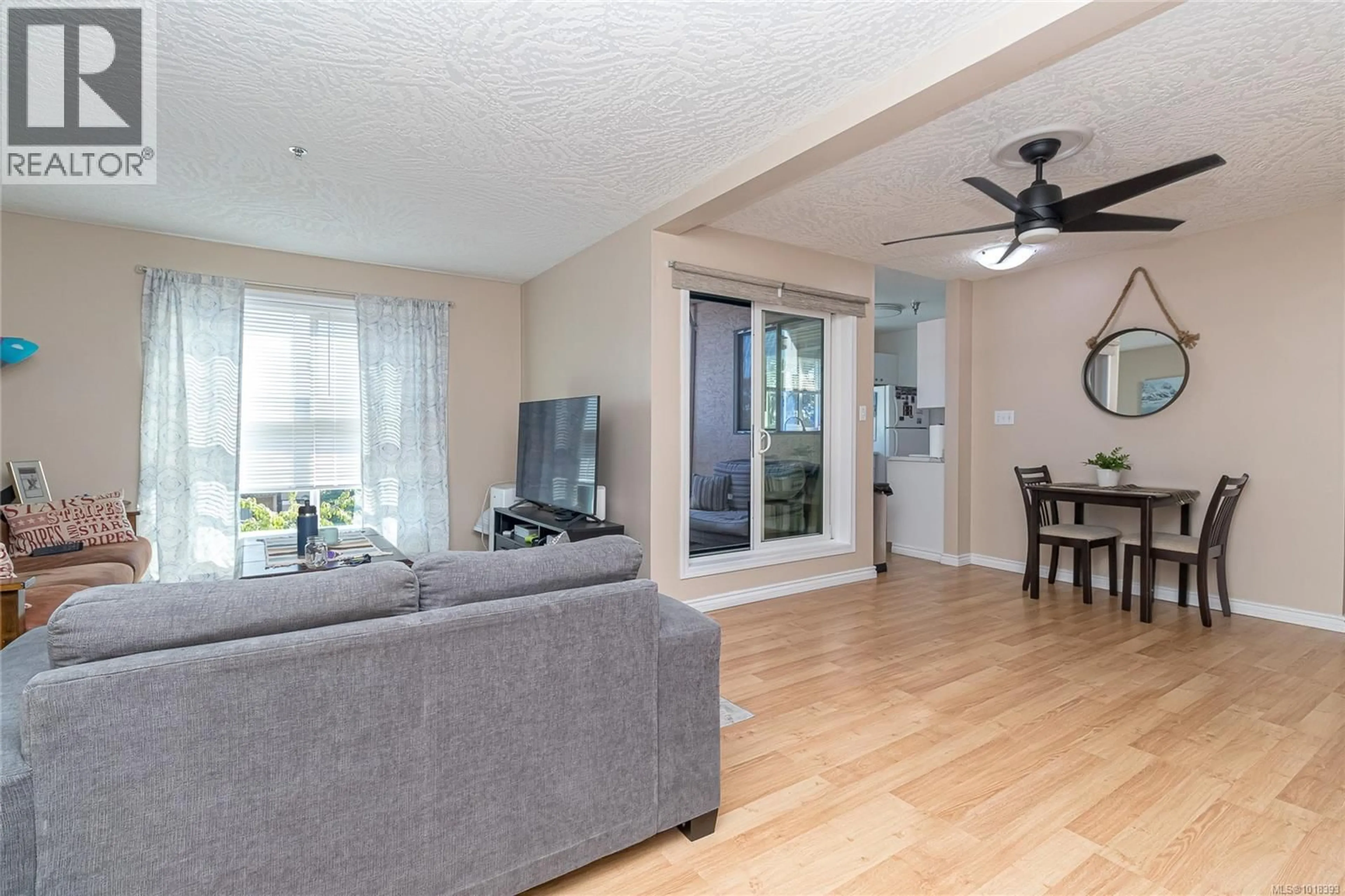 Living room with furniture, unknown for 312 - 3460 QUADRA STREET, Saanich British Columbia V8X1G6