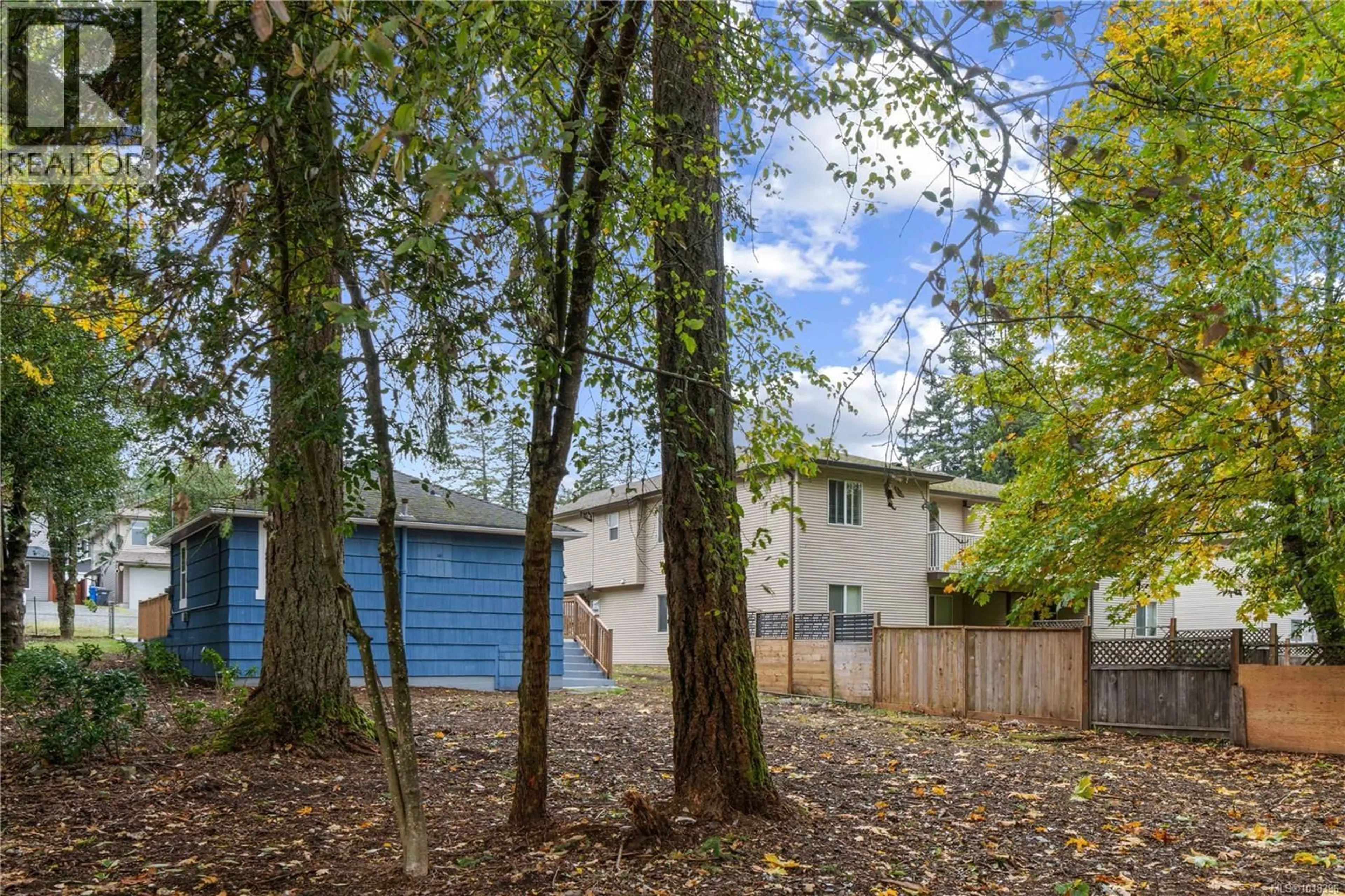 A pic from outside/outdoor area/front of a property/back of a property/a pic from drone, forest/trees view for 656 LAMBERT AVENUE, Nanaimo British Columbia V9R3N8