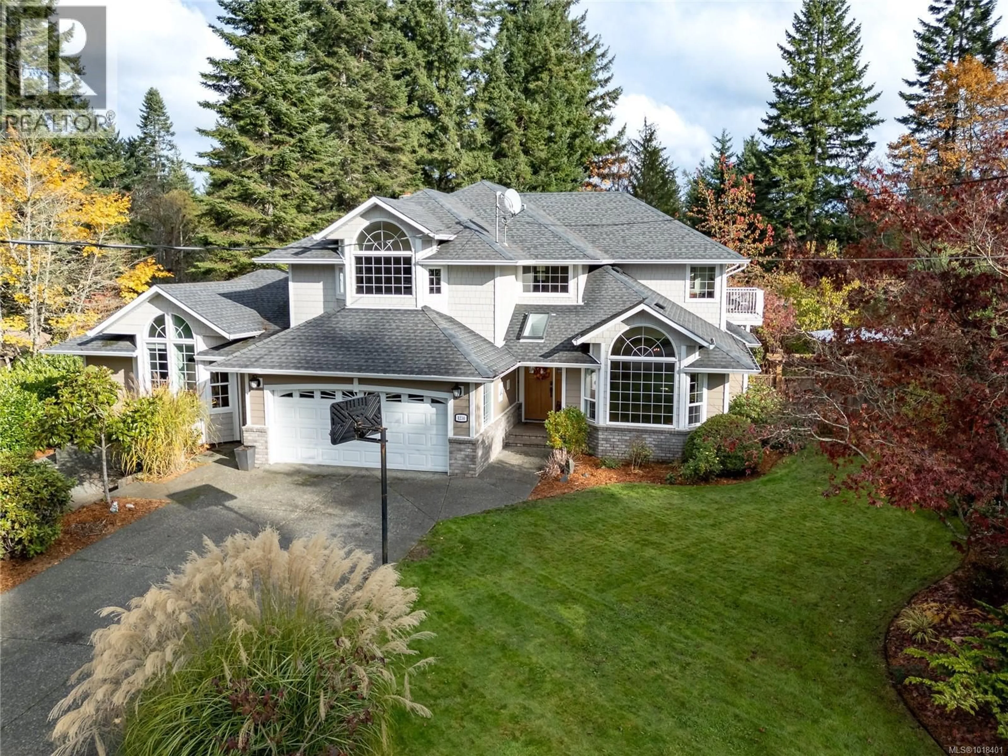 A pic from outside/outdoor area/front of a property/back of a property/a pic from drone, street for 1230 GLEN URQUHART DRIVE, Courtenay British Columbia V9N3Y2