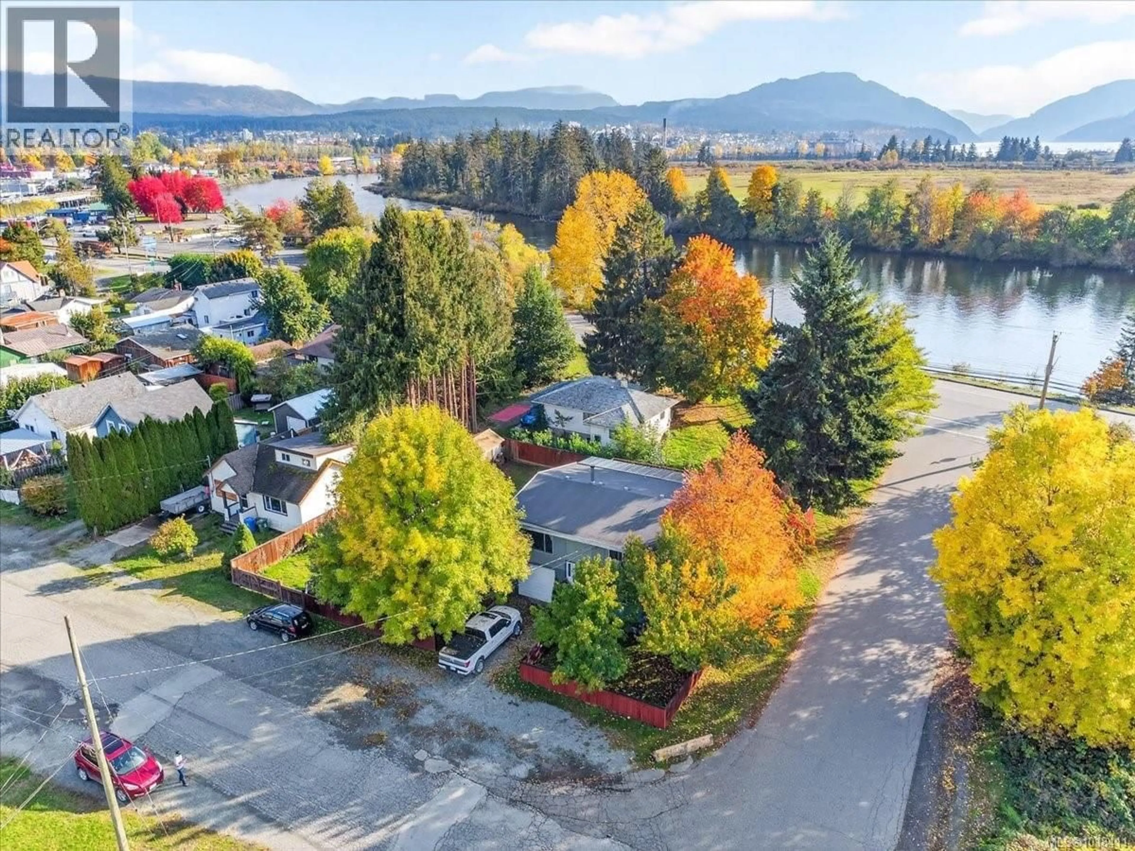 A pic from outside/outdoor area/front of a property/back of a property/a pic from drone, water/lake/river/ocean view for 5238 HEASLIP ROAD, Port Alberni British Columbia V9Y6Z9