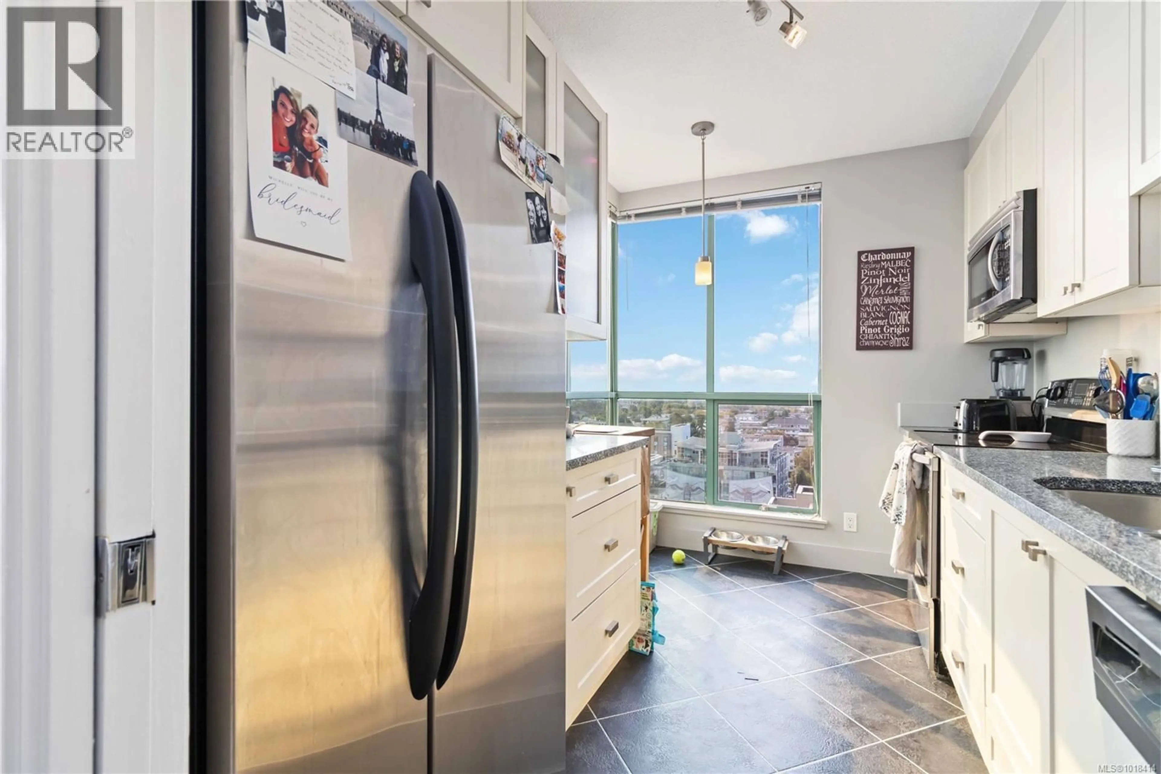 Kitchen with laundary machines, ceramic/tile floor for 1507 - 1020 VIEW STREET, Victoria British Columbia V8V4Y4