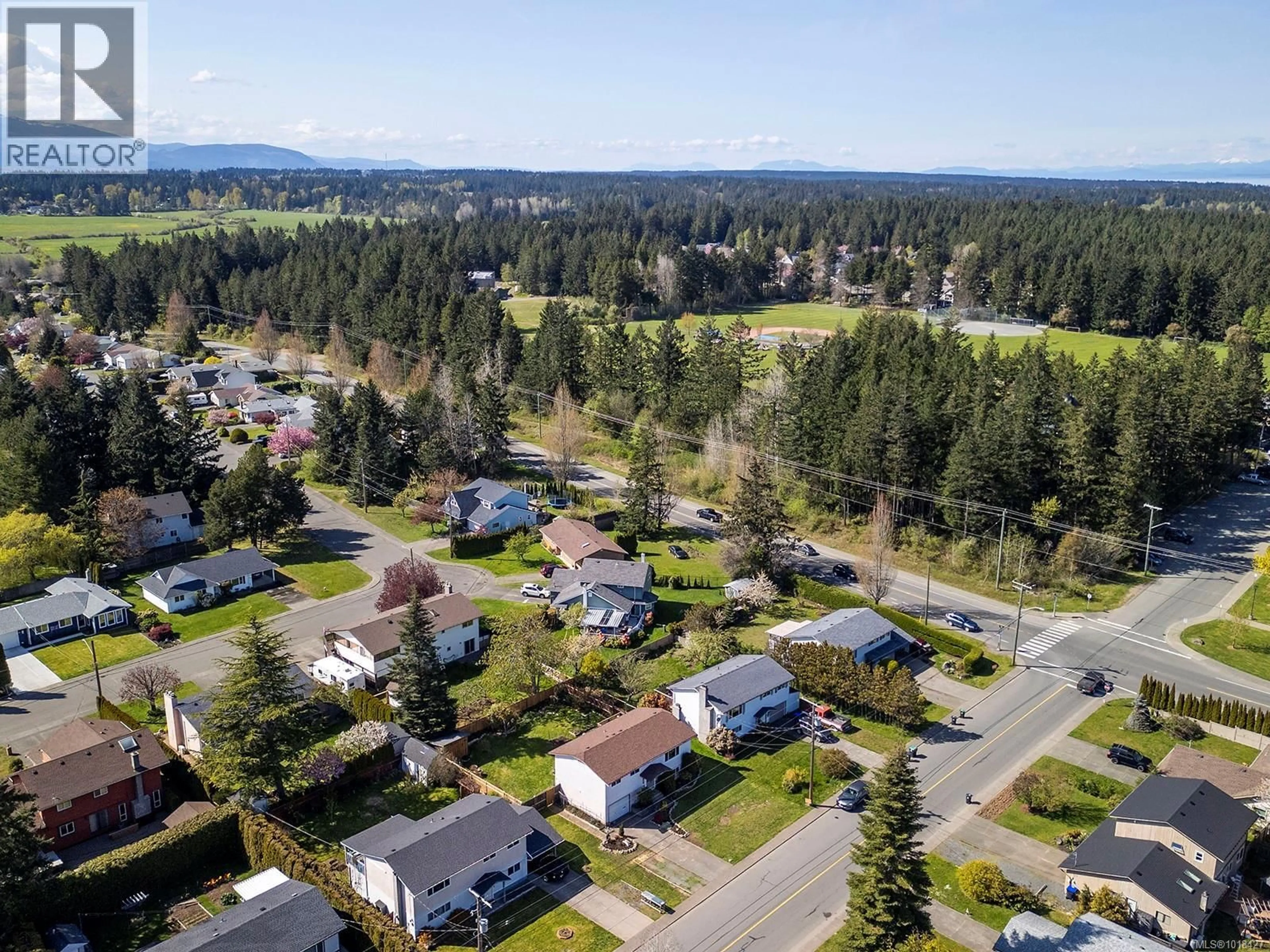 A pic from outside/outdoor area/front of a property/back of a property/a pic from drone, unknown for 667 TORRENCE ROAD, Comox British Columbia V9M3H6