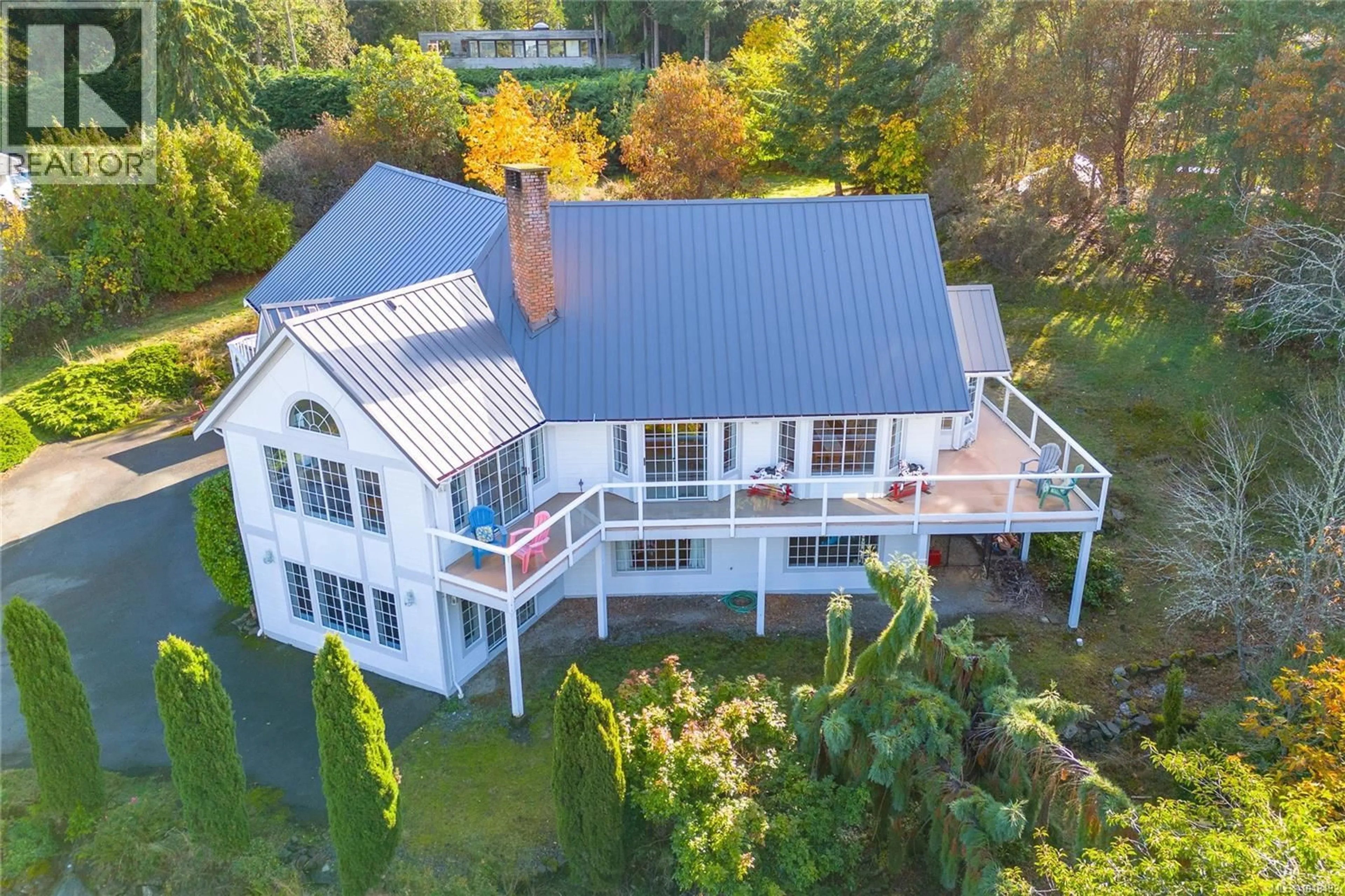 A pic from outside/outdoor area/front of a property/back of a property/a pic from drone, water/lake/river/ocean view for 11474 SUMAC DRIVE, North Saanich British Columbia V8L5J8