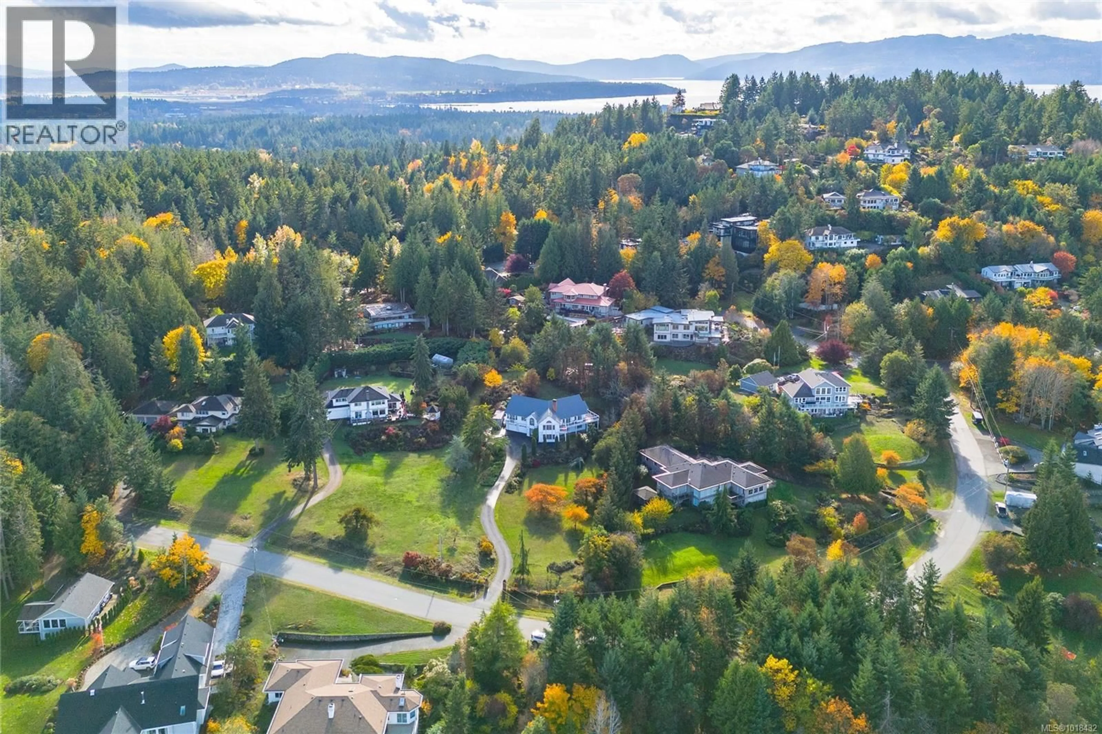 A pic from outside/outdoor area/front of a property/back of a property/a pic from drone, mountain view for 11474 SUMAC DRIVE, North Saanich British Columbia V8L5J8