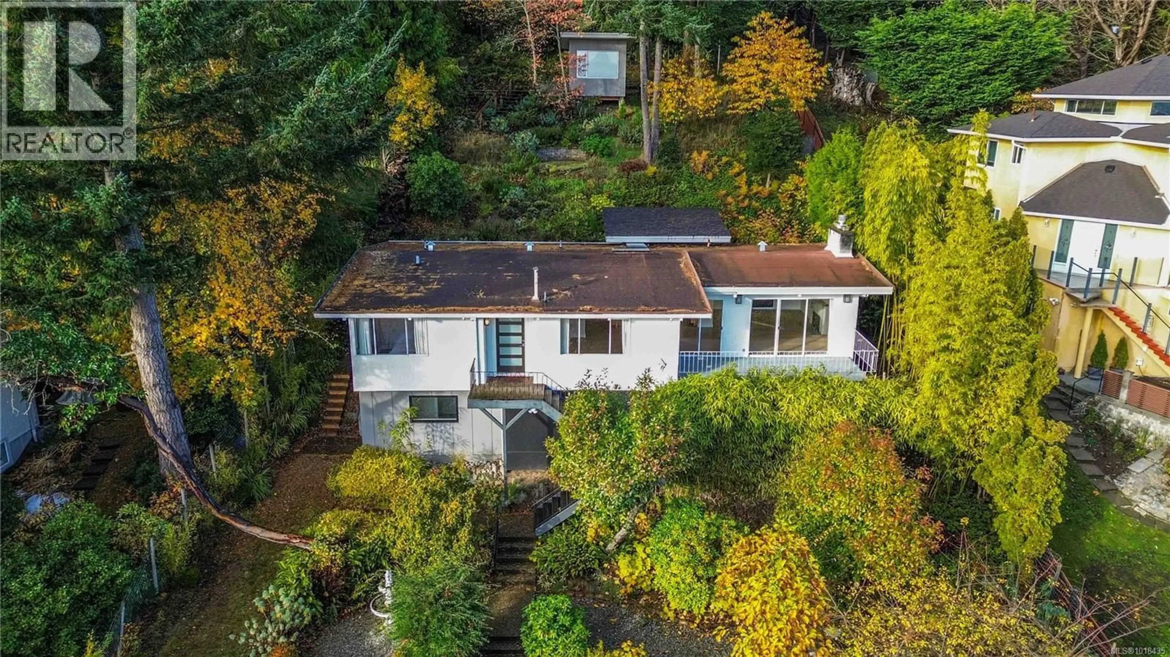 A pic from outside/outdoor area/front of a property/back of a property/a pic from drone, street for 4882 LOCHSIDE DRIVE, Saanich British Columbia V8Y2E4