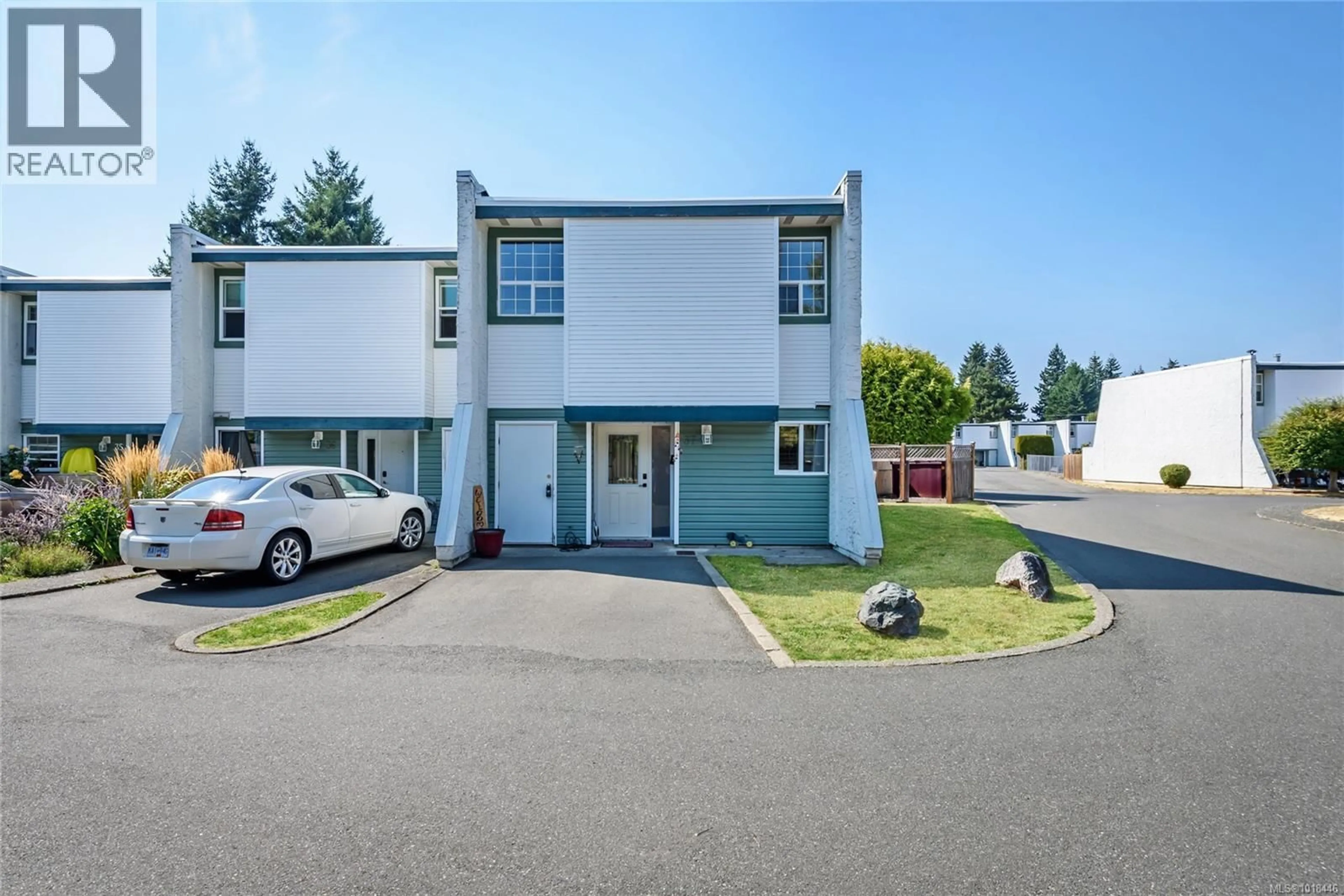 A pic from outside/outdoor area/front of a property/back of a property/a pic from drone, street for 37 - 1957 GUTHRIE ROAD, Comox British Columbia V9M2J2