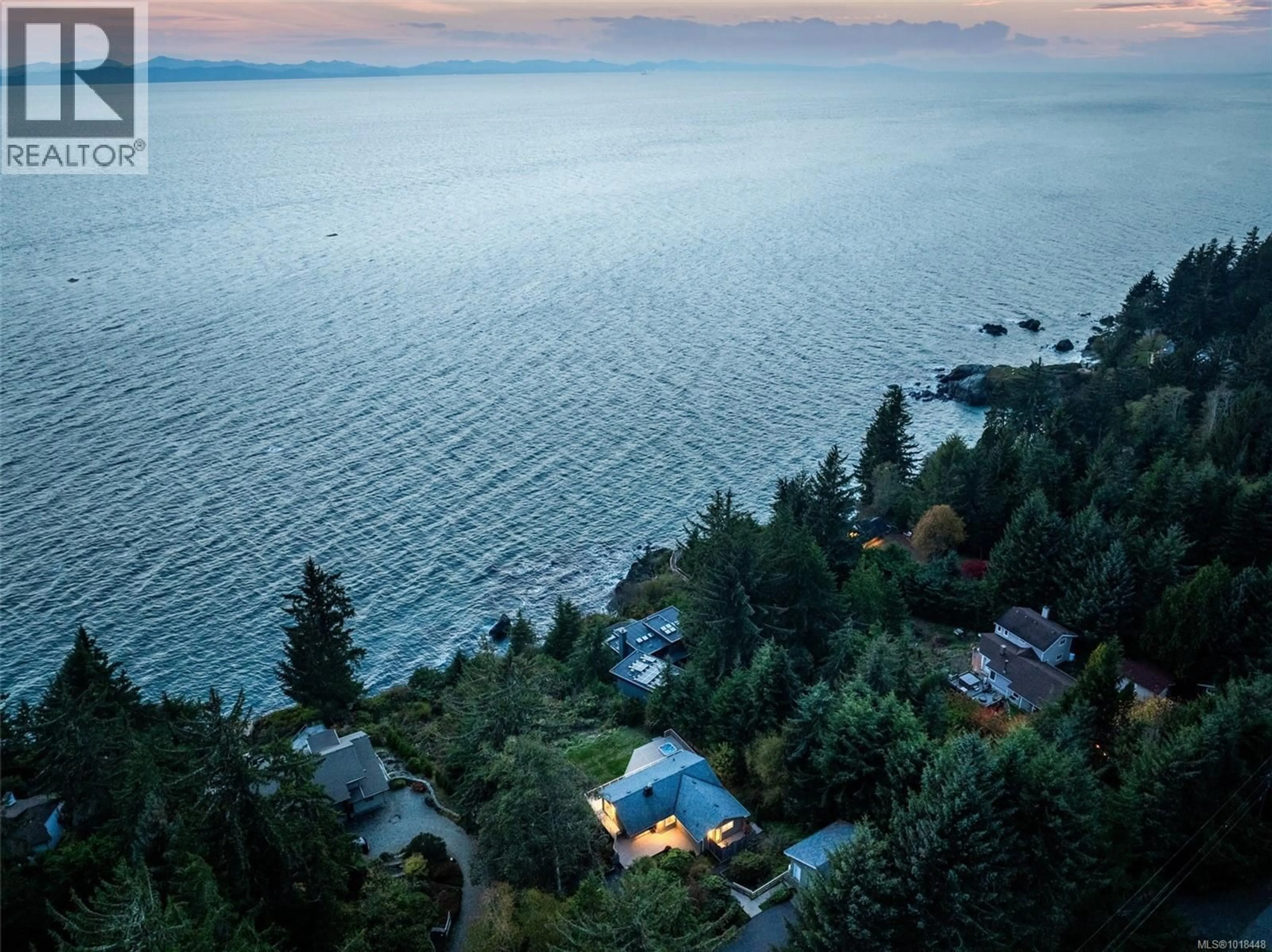 A pic from outside/outdoor area/front of a property/back of a property/a pic from drone, water/lake/river/ocean view for 2594 SEASIDE DRIVE, Sooke British Columbia V9Z1G7